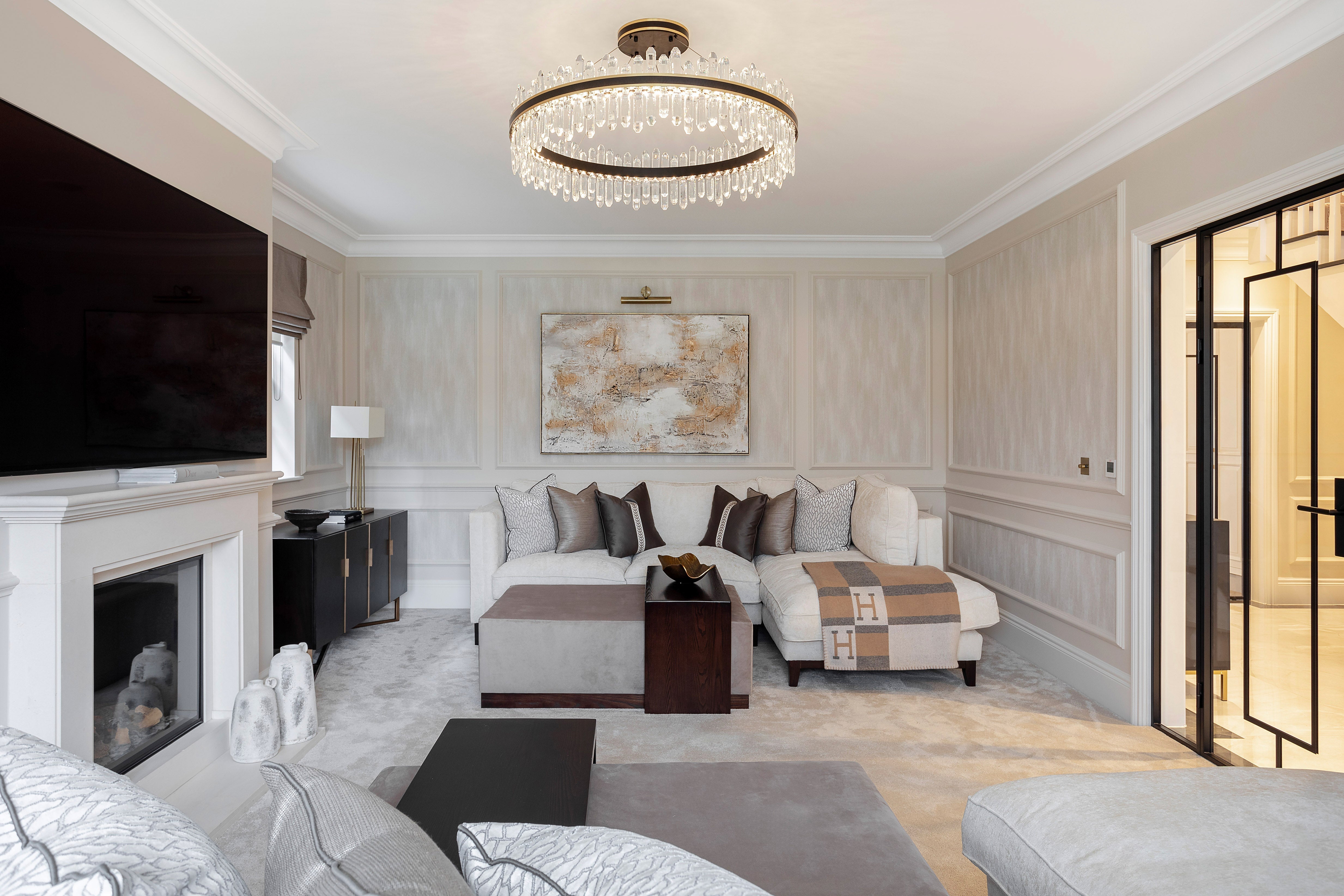 Luxury VORELLI® living room chandelier in modern Dubai villa interior
