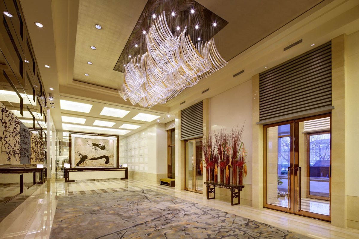 Amber Gradient Bent Glass Tube Project Installation architectural lighting view 3