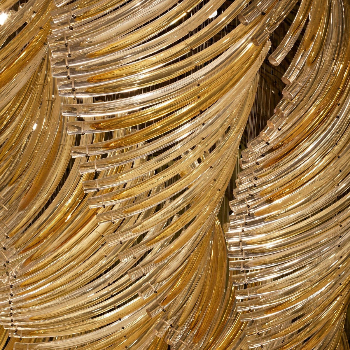 Amber Gradient Bent Glass Tube Project Installation architectural lighting view 2