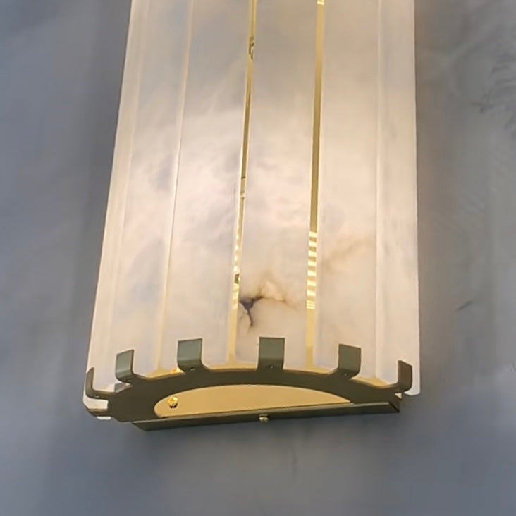 cicci marble wall light side profile showing tall sculptural silhouette