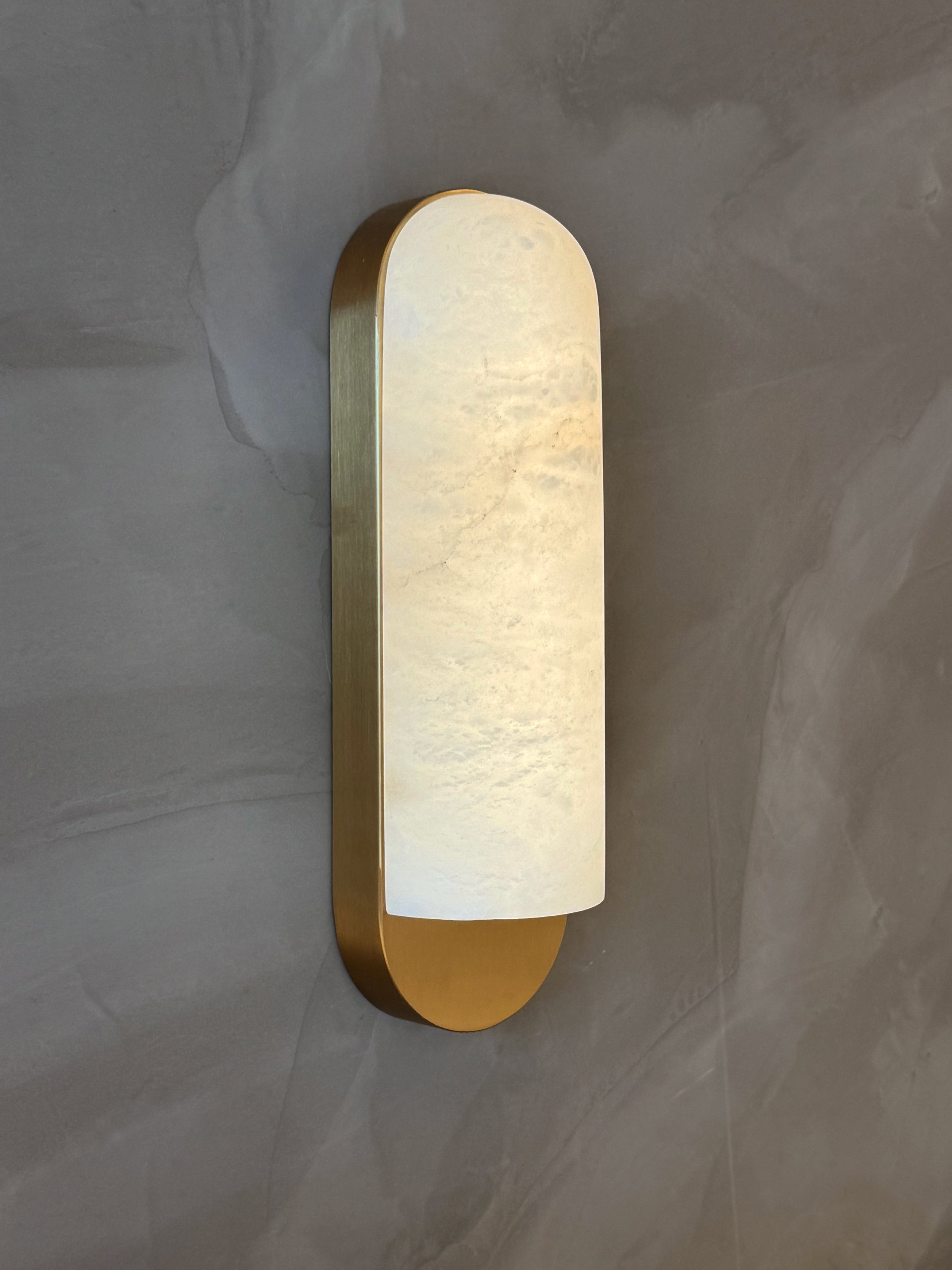 Close-up of natural marble texture on Formello wall light