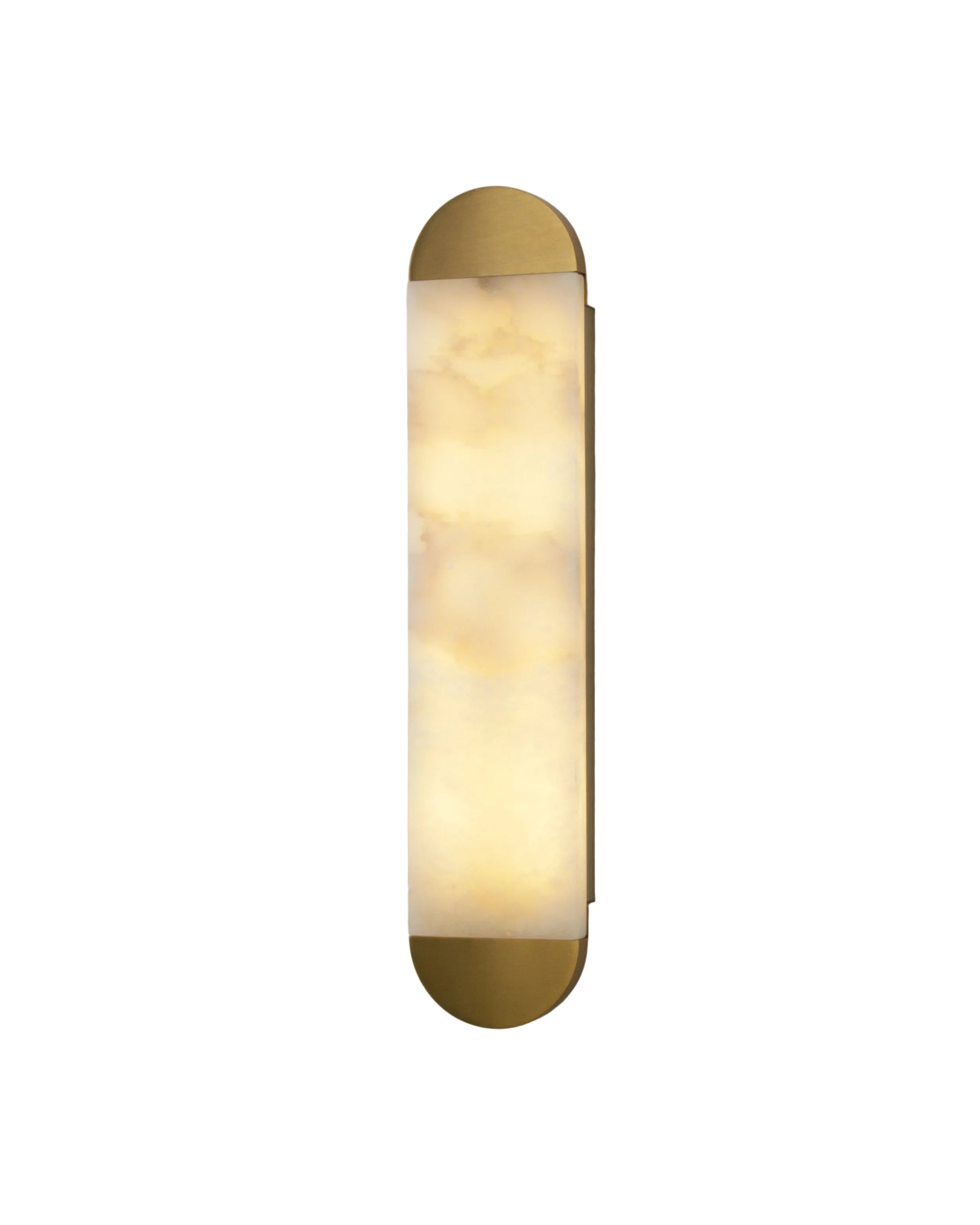 Angled view of Lira marble wall light showing rounded sculptural form and warm illumination