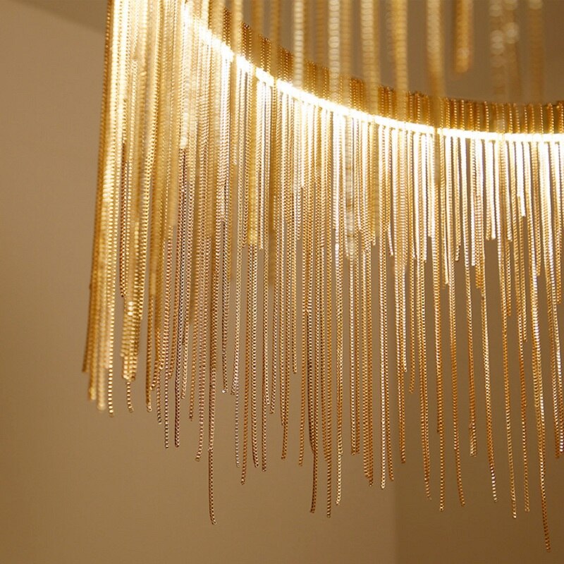 Close up of cascading metal chains on Adlington rectangular chandelier