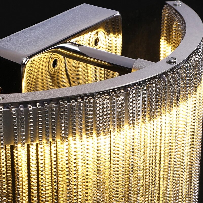 Close up of Adlington wall light frame and chain detailing