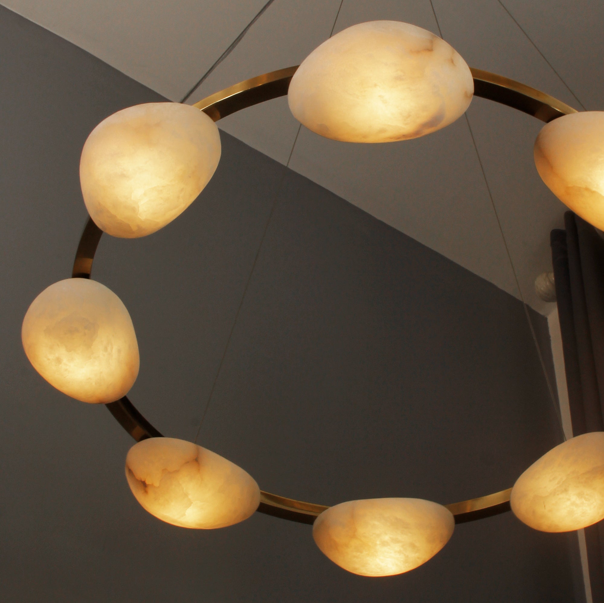 Close up detail of marble elements on Alba circular chandelier