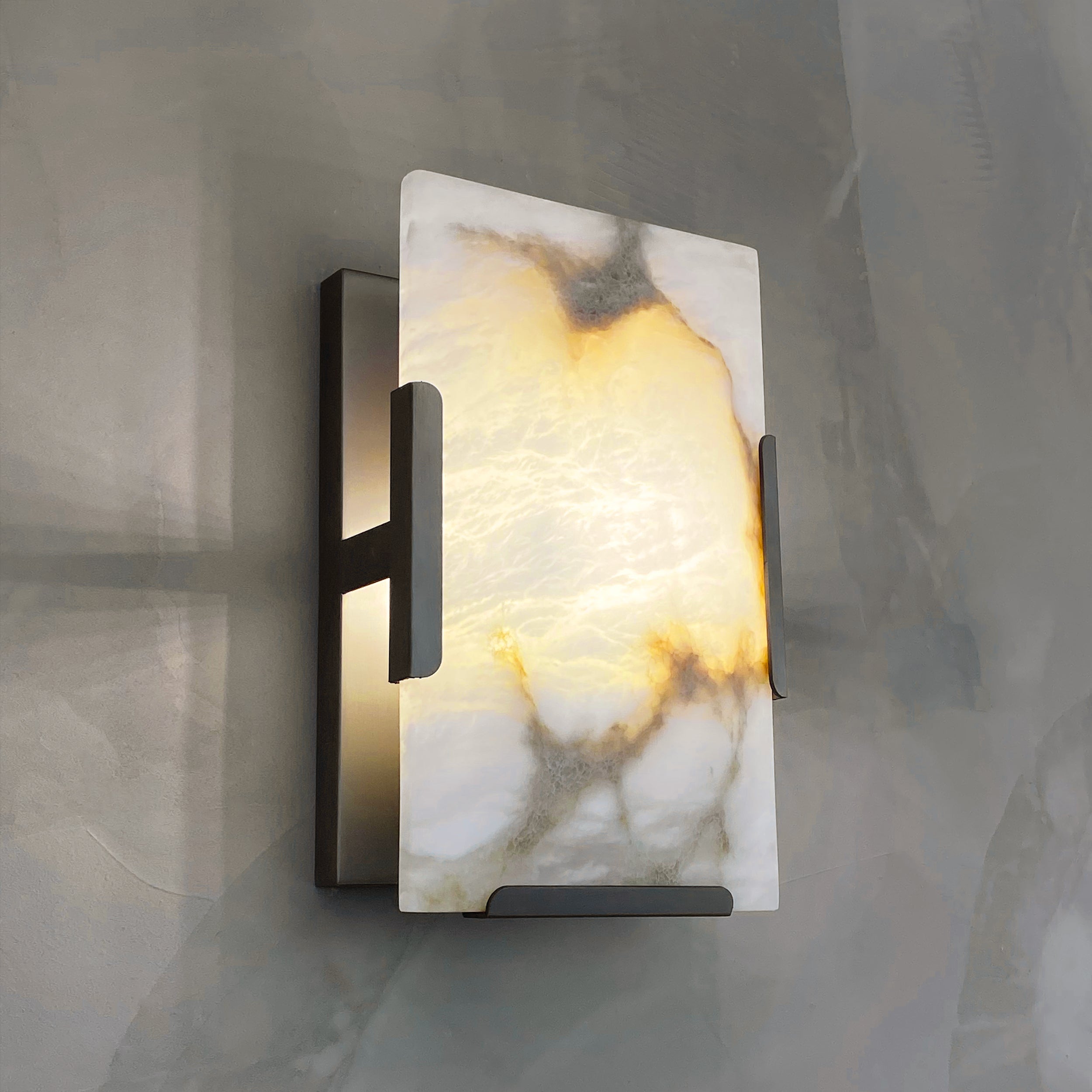 Angel Marble Wall Light installed on modern wall with warm glow