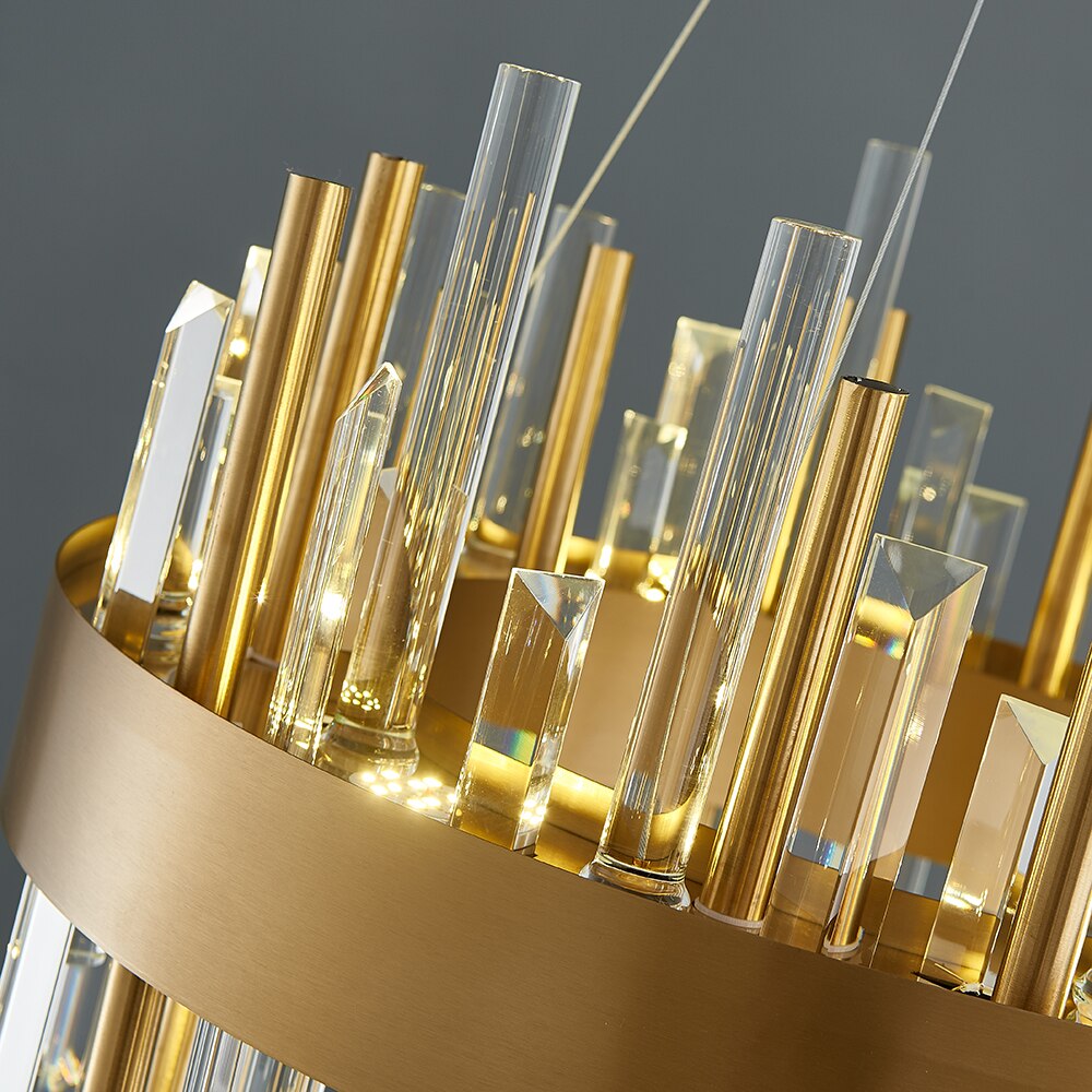 Close up of Ardmore Circular Chandelier crystal bars and gold tubing