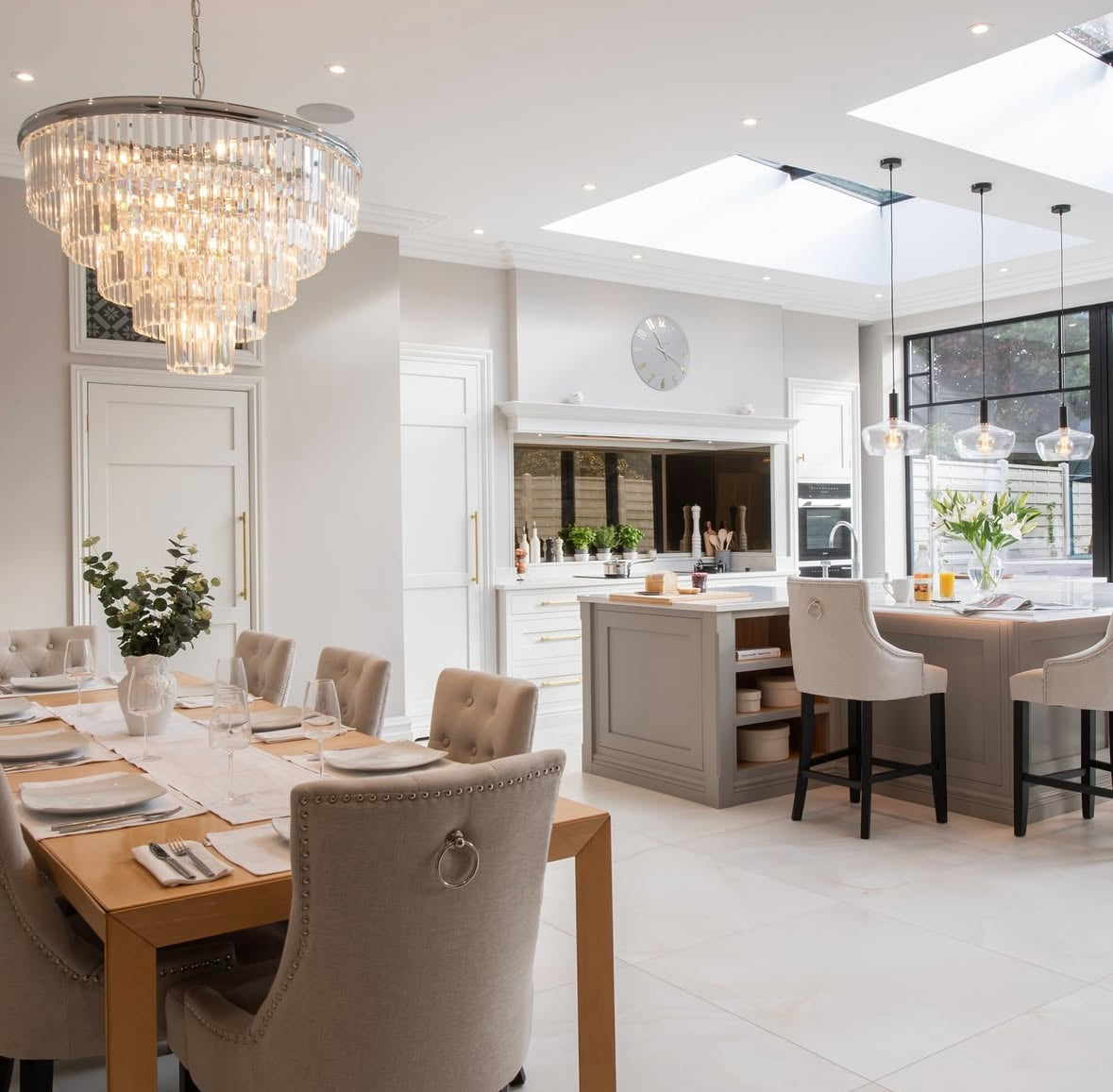 Beckenham circular crystal chandelier above dining table