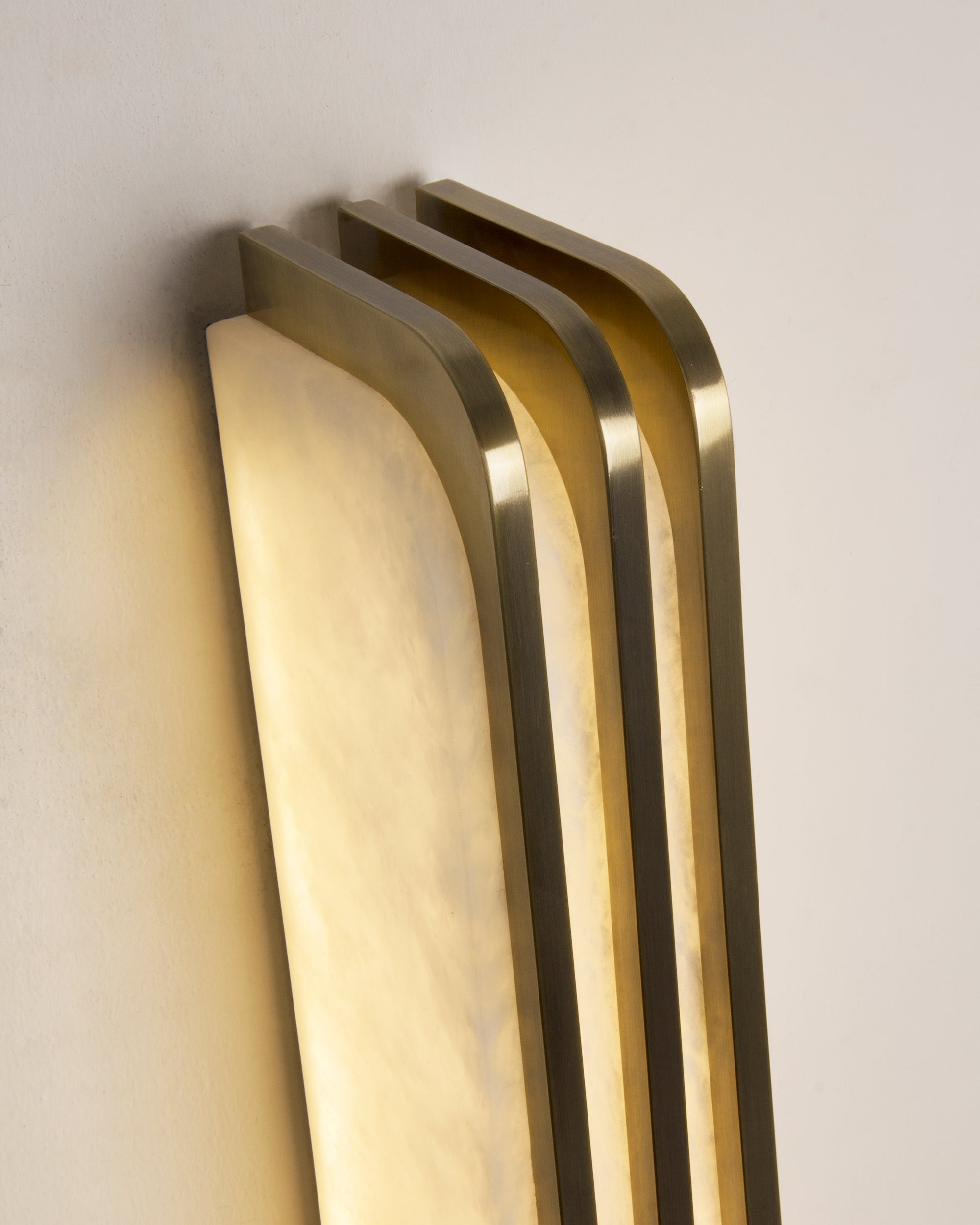 Close-up of natural marble diffuser on Bellagio wall light