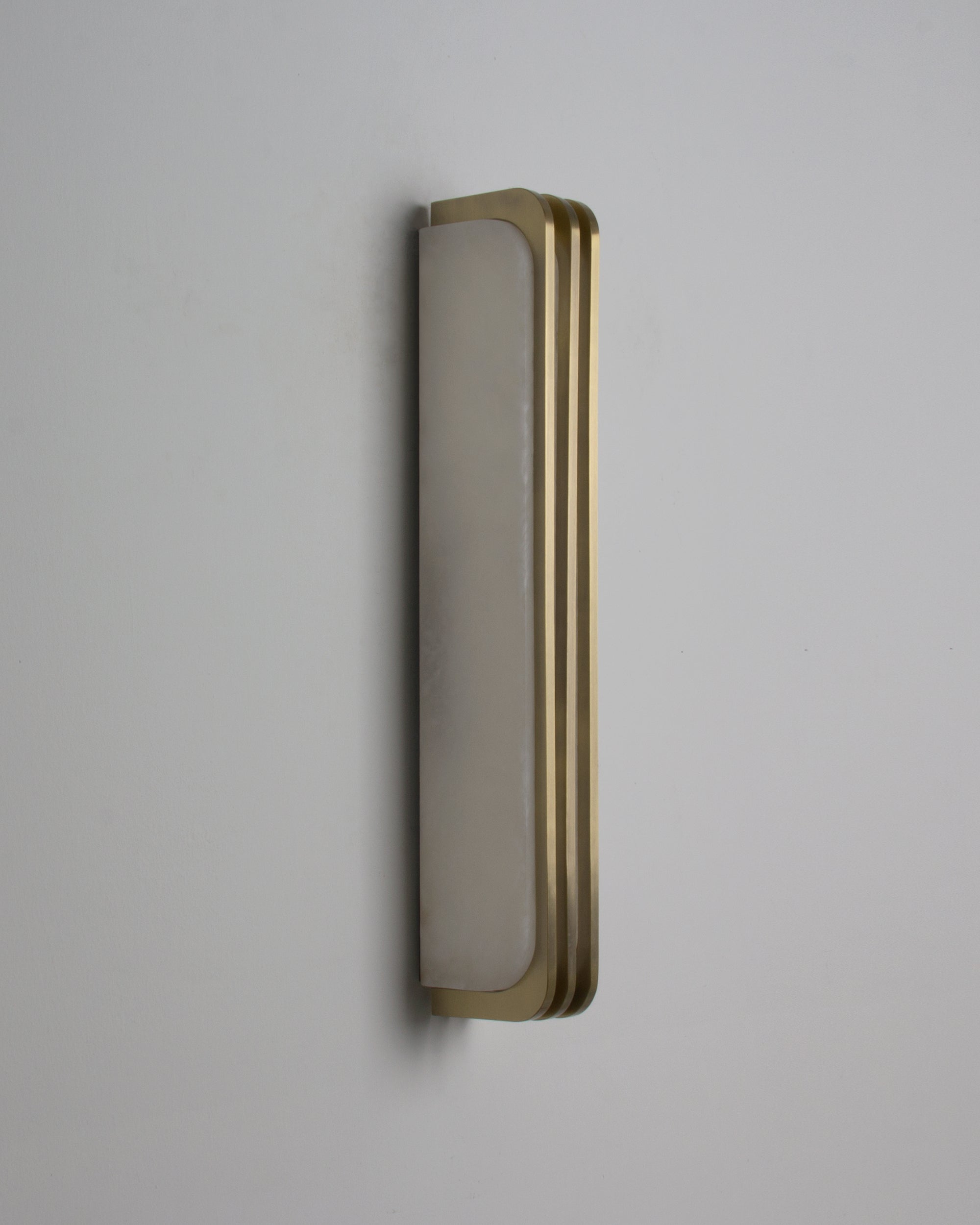 Bellagio marble wall light mounted on modern interior wall