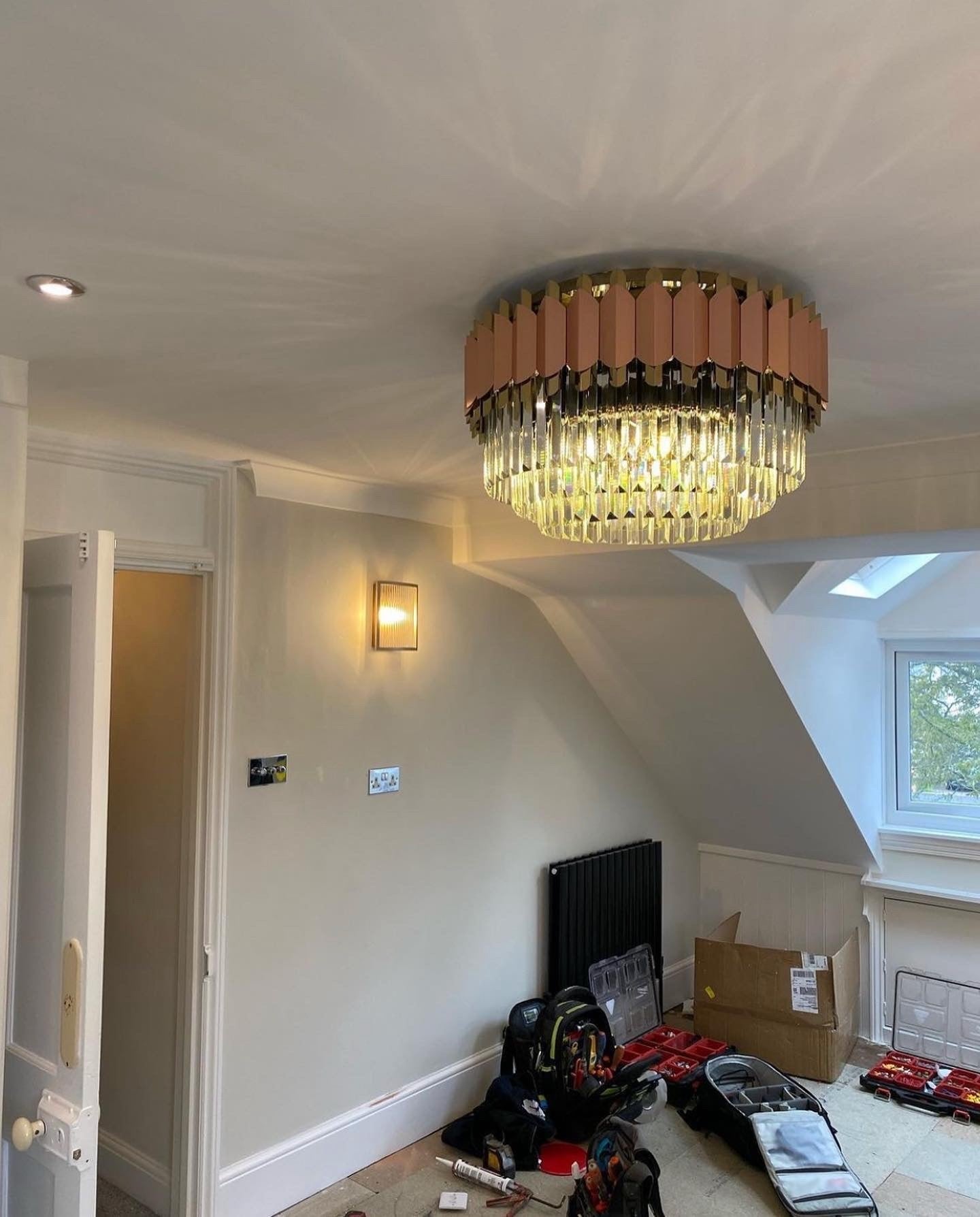 Bianca crystal chandelier installed in luxury bedroom interior