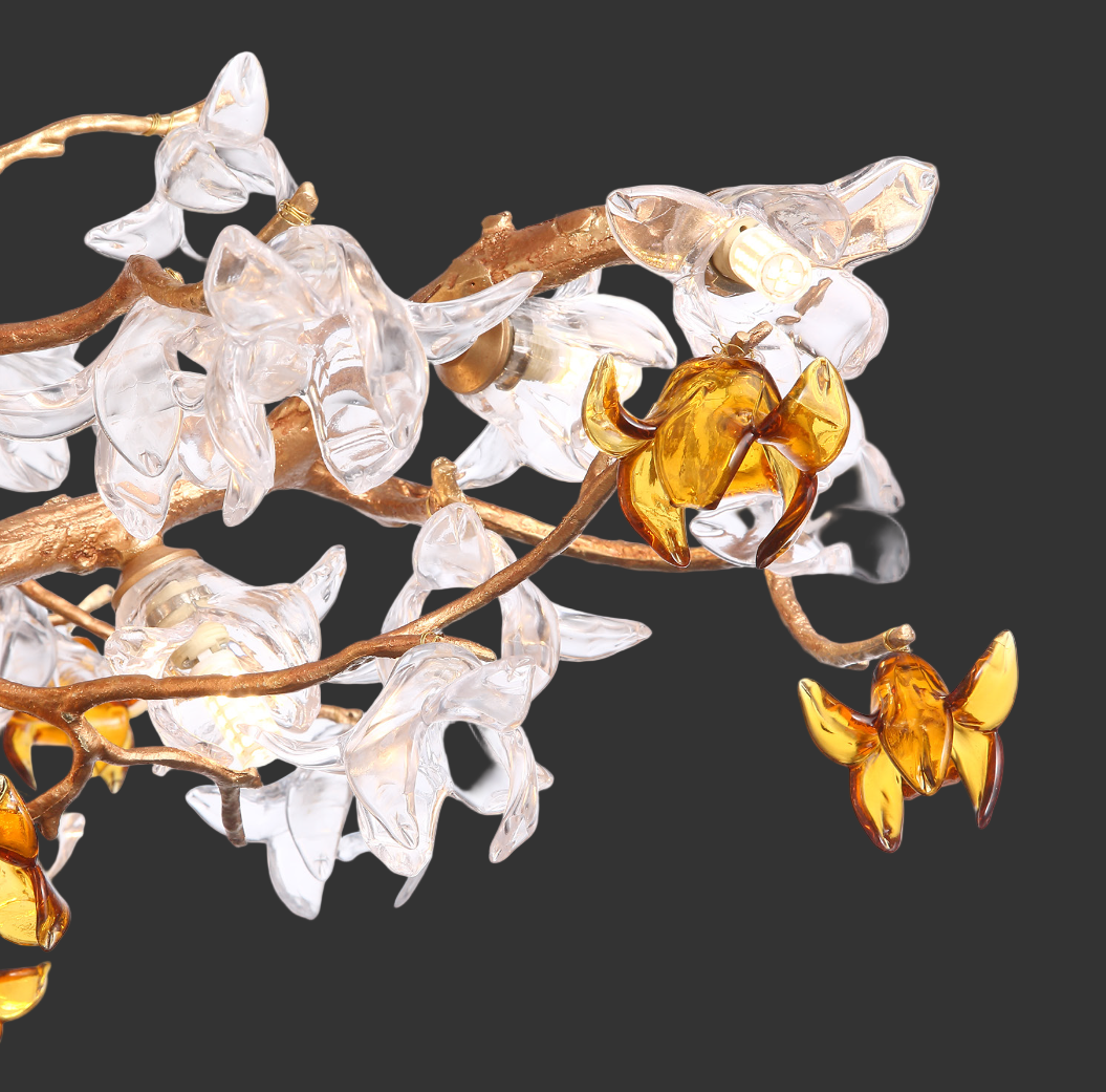 Close-up of flowing glass petals and amber detailing on Bloom pendant light