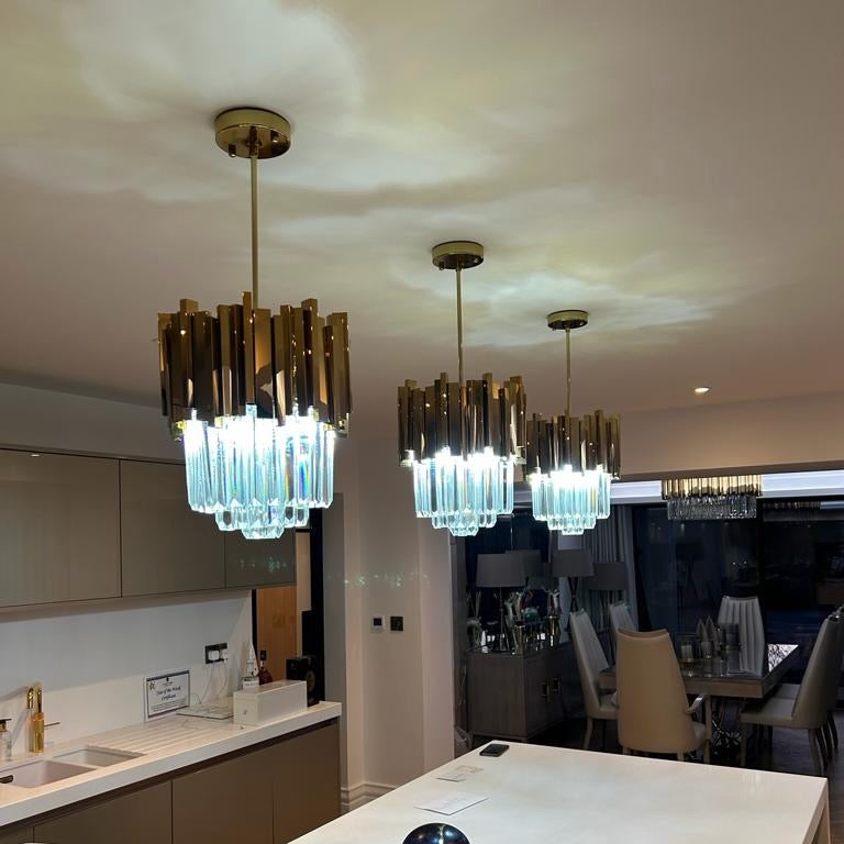 Multiple Boeotia pendant lights installed over kitchen counter