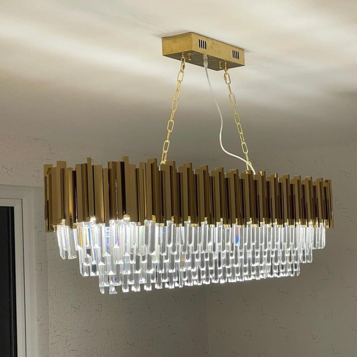 Boeotia rectangular chandelier installed on modern ceiling