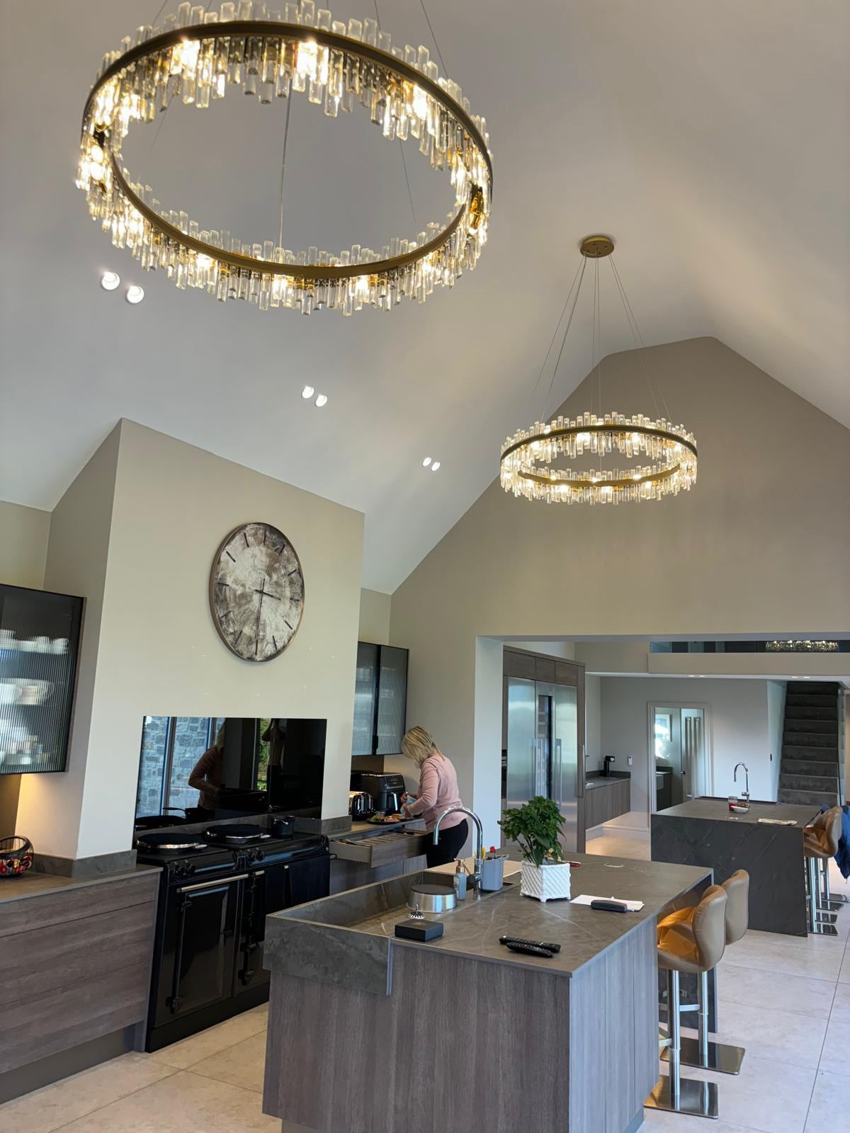 Brighouse circular chandelier installed in a luxury open-plan kitchen with crystal ring detailing
