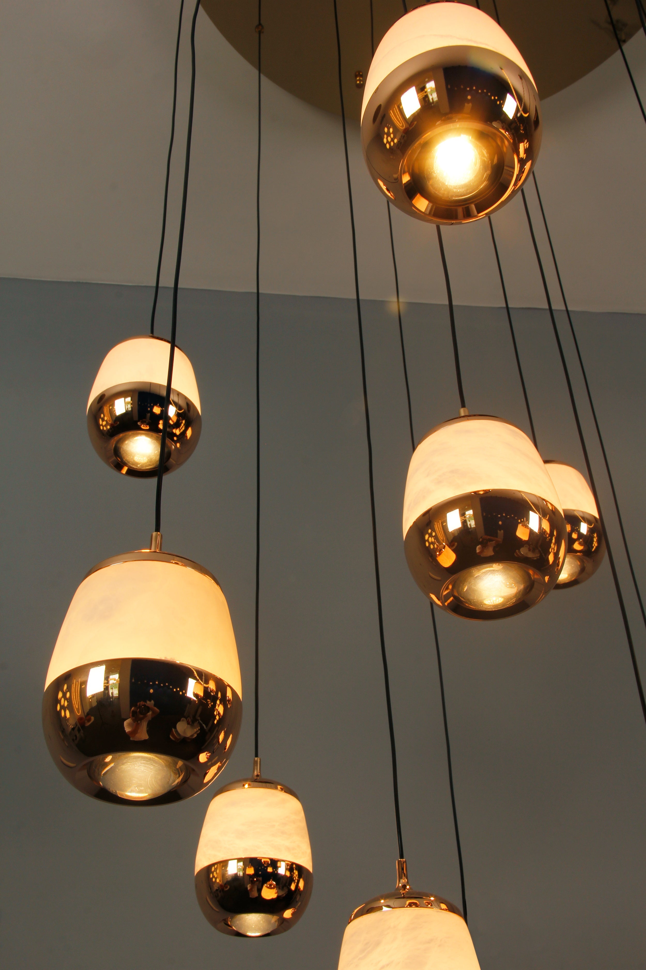 Sculptural marble pendant with warm ambient glow