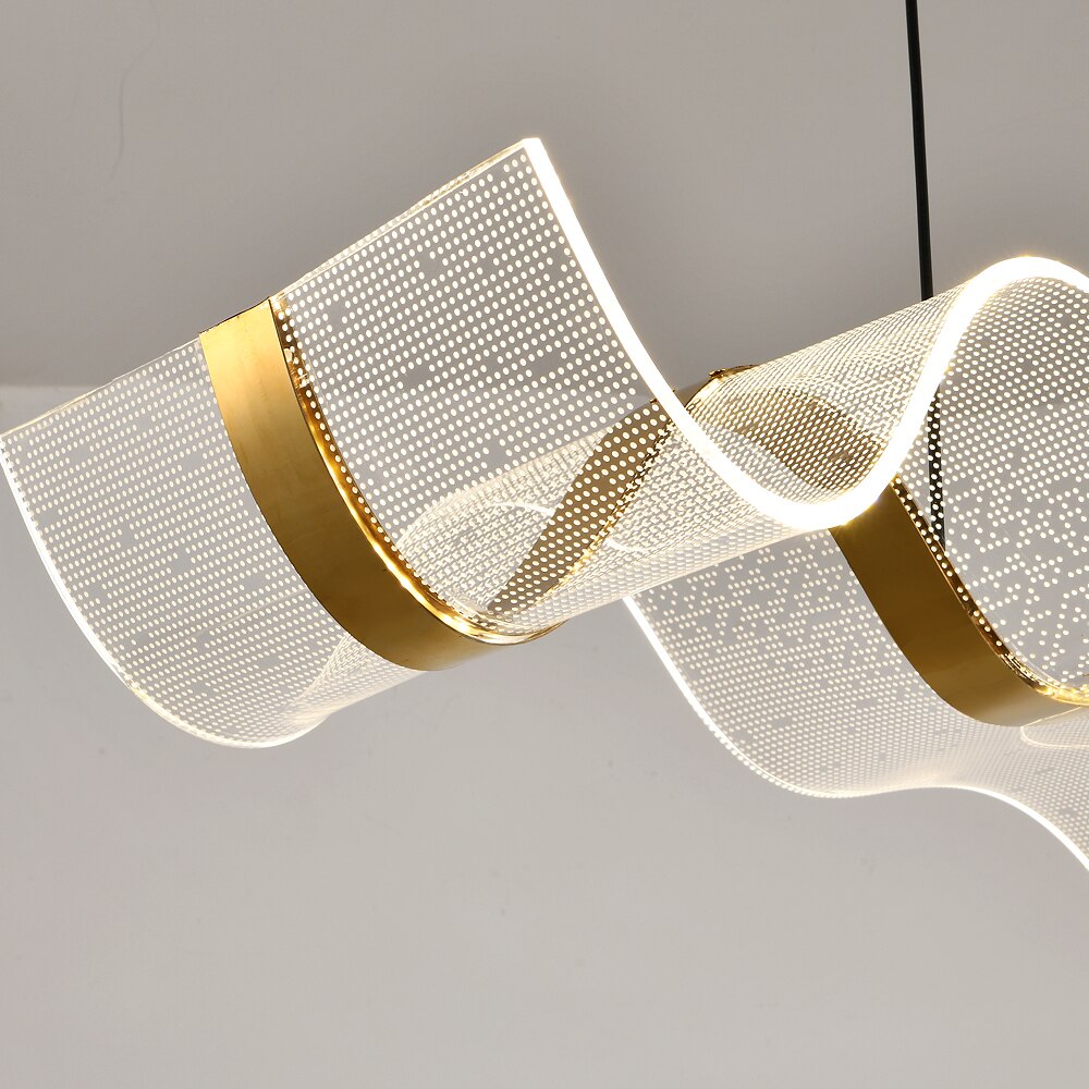 Brass accent detail on curved modern chandelier