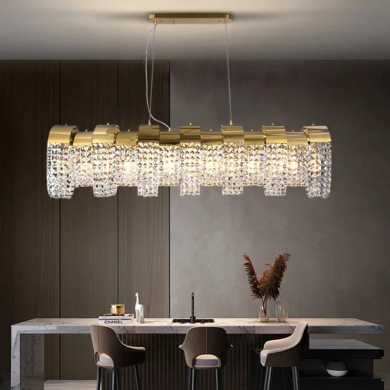 Rectangular crystal chandelier installed above dining table