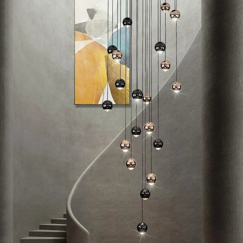 Carlito sphere pendant chandelier beside curved staircase