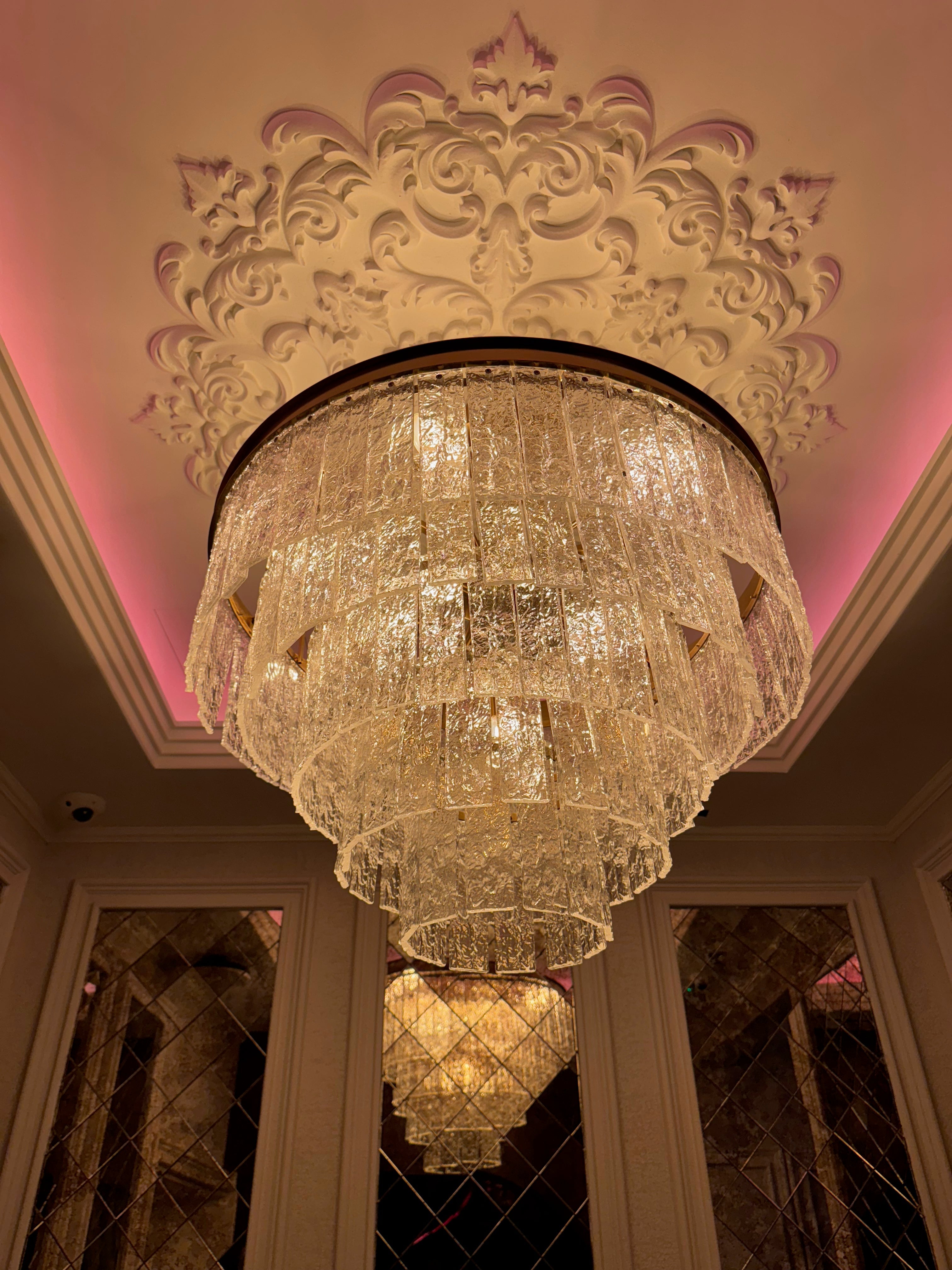 Elegant Cellini circular chandelier featuring multi-tier cracked textured rectangle crystals for sophisticated interior lighting
