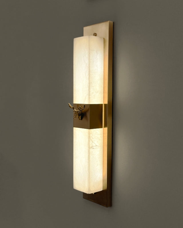 Close up of luxury marble wall light with metal accent