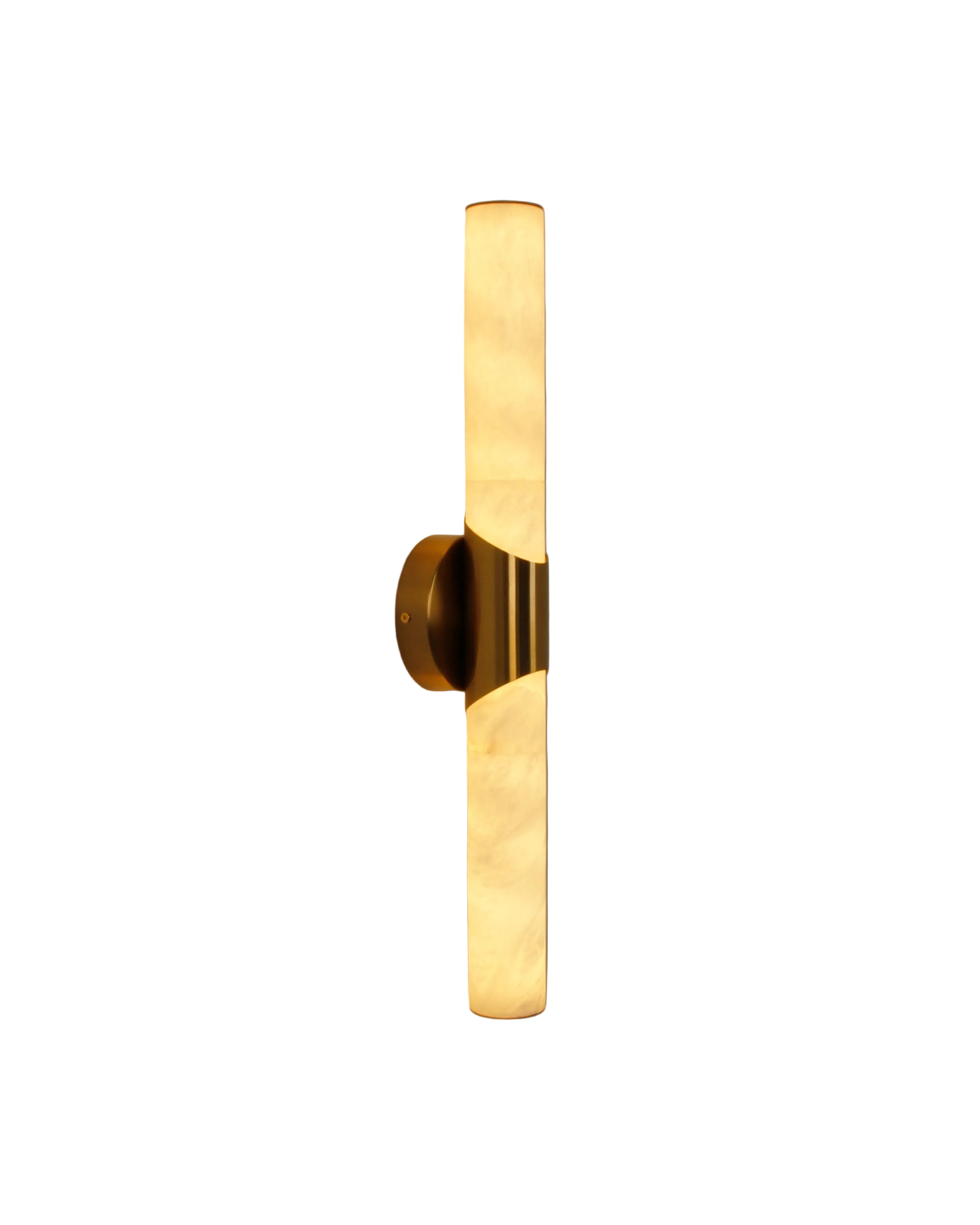 cilindro marble wall light in tall cylindrical form with warm illuminated marble