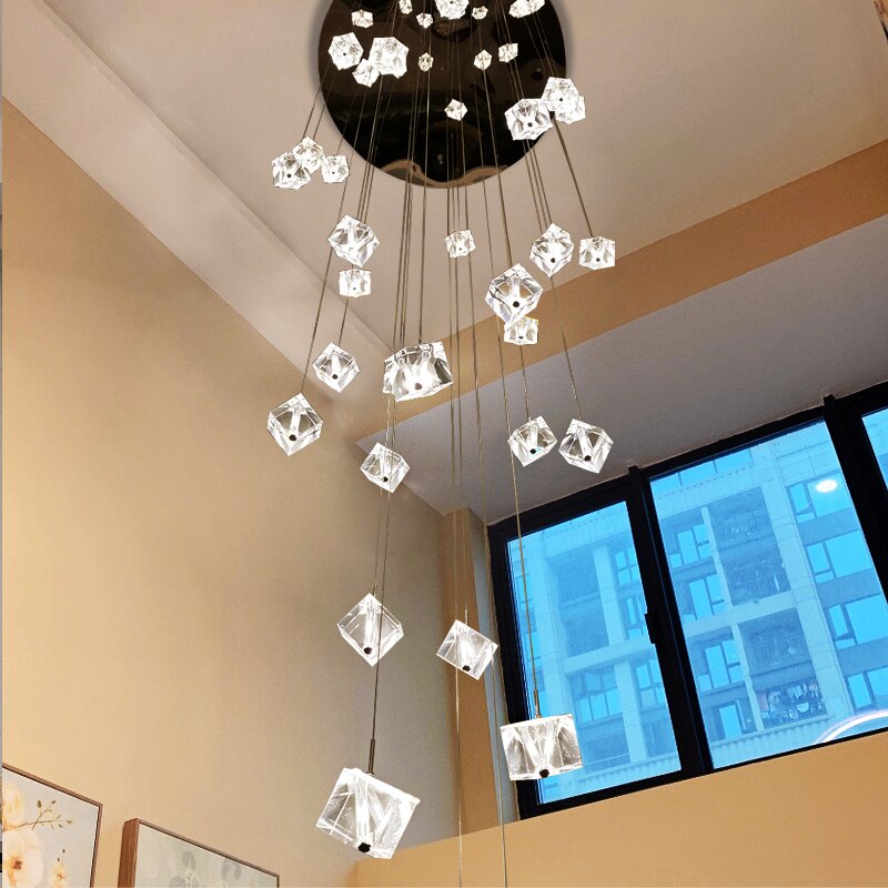 crenshaw cube crystal staircase chandelier illuminating double height interior