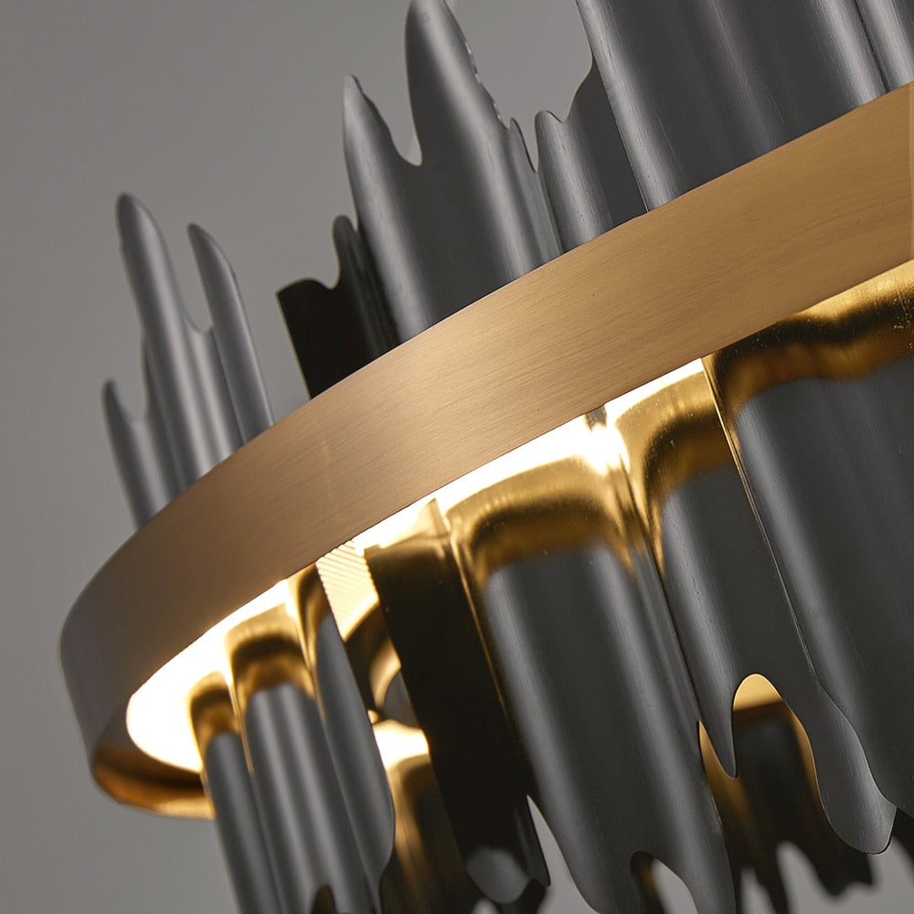 Side angle showing layered ring structure and decorative fins on the chandelier