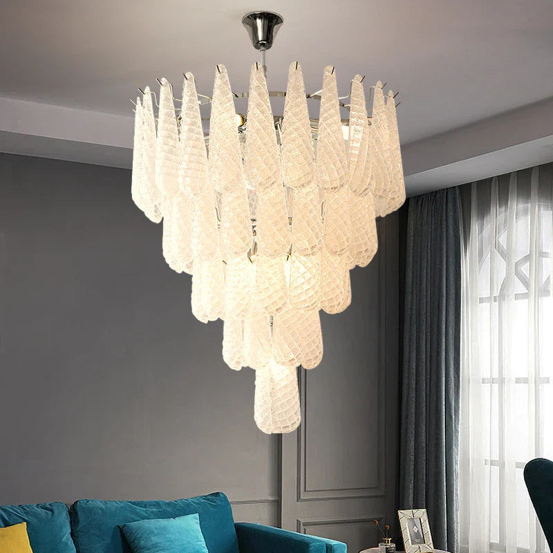 Eclissi Grandeur staircase chandelier by VORELLI® featuring cascading diamond cut teardrop crystals in a dramatic luxury formation