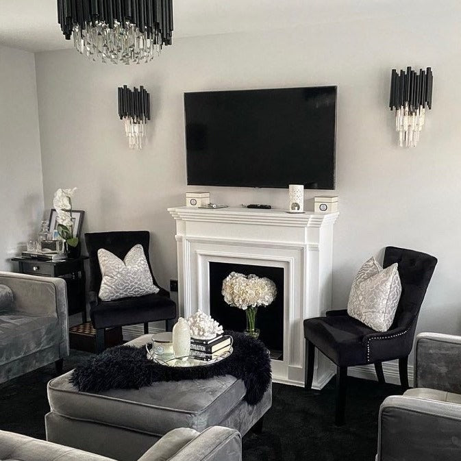 Gotham wall lights styled in a luxury living room with soft ambient illumination