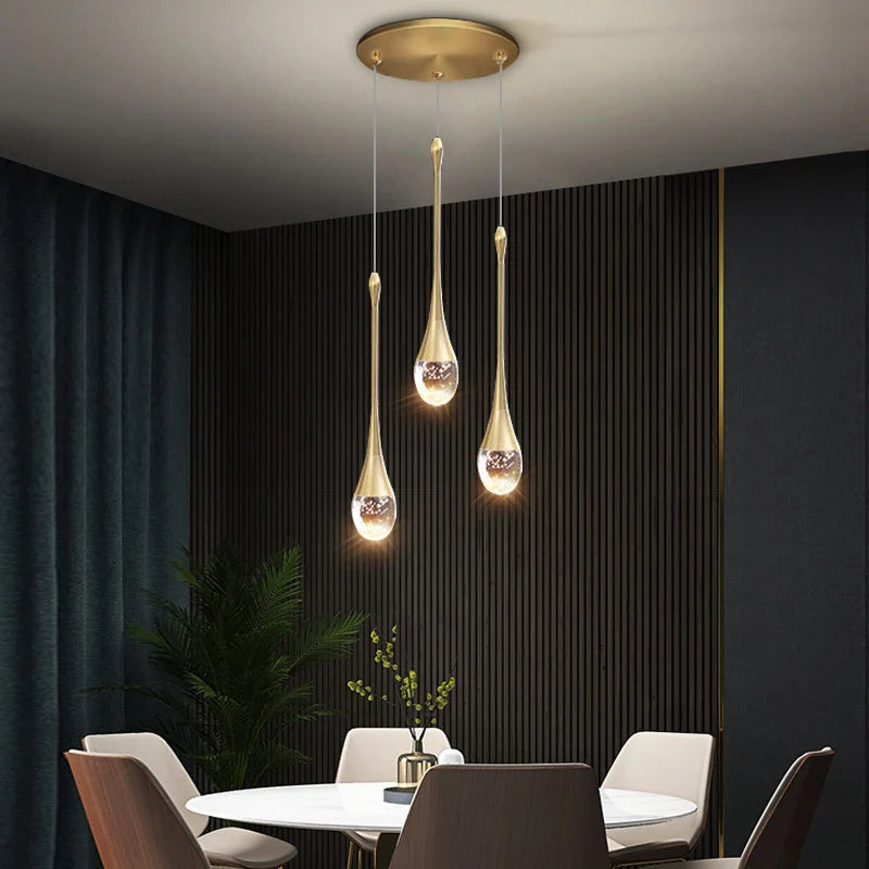 Henley Pendant Staircase Chandelier installed as a trio in a contemporary interior