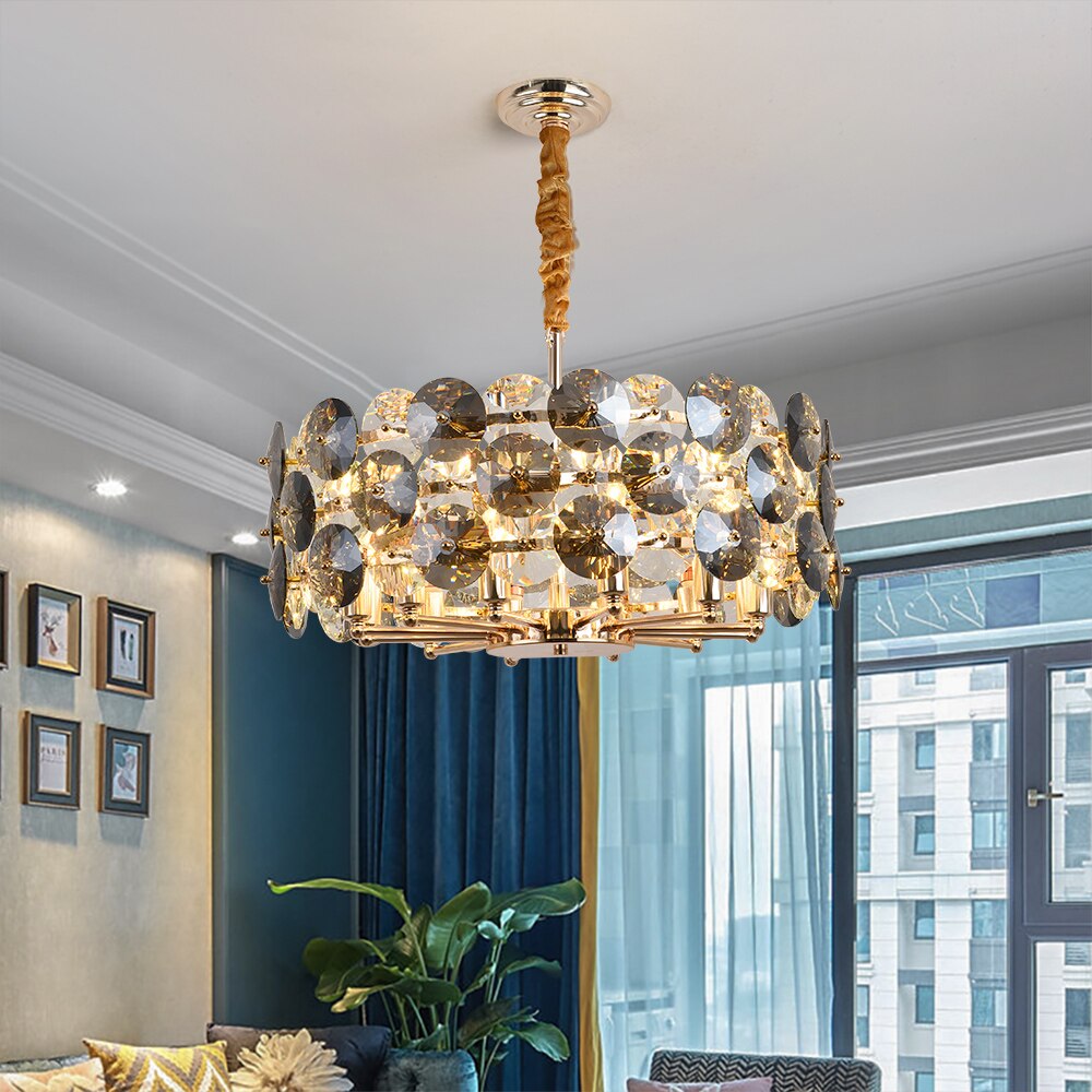 Modern interior featuring a circular smoky crystal chandelier creating warm ambient lighting