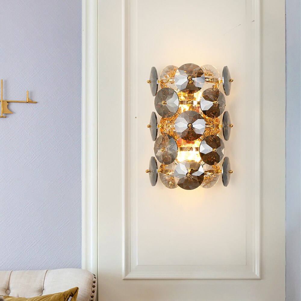 Modern interior featuring a Lorenzo smoky crystal wall light creating warm ambient illumination