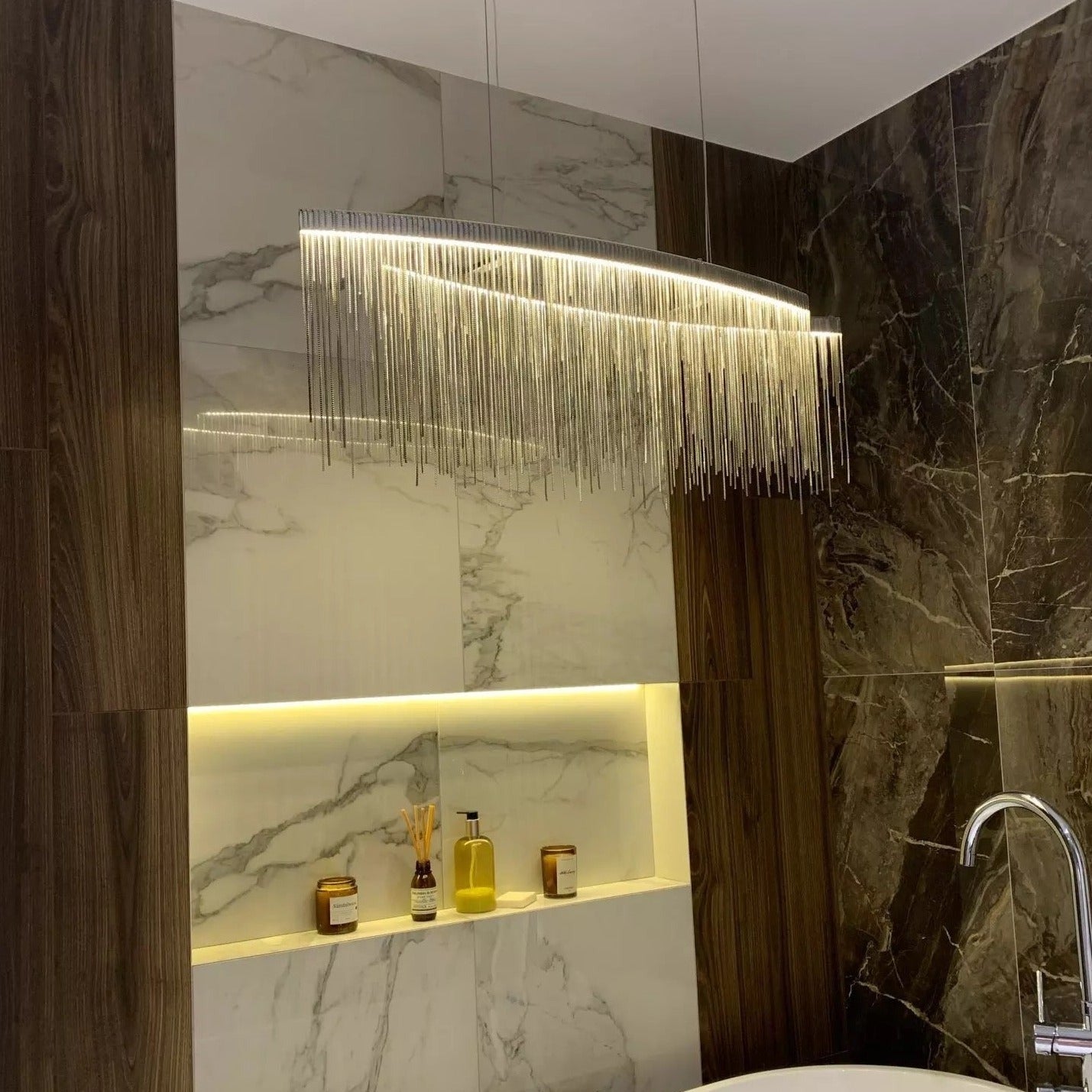 Luxury rectangular chandelier with cascading chains in UAE villa