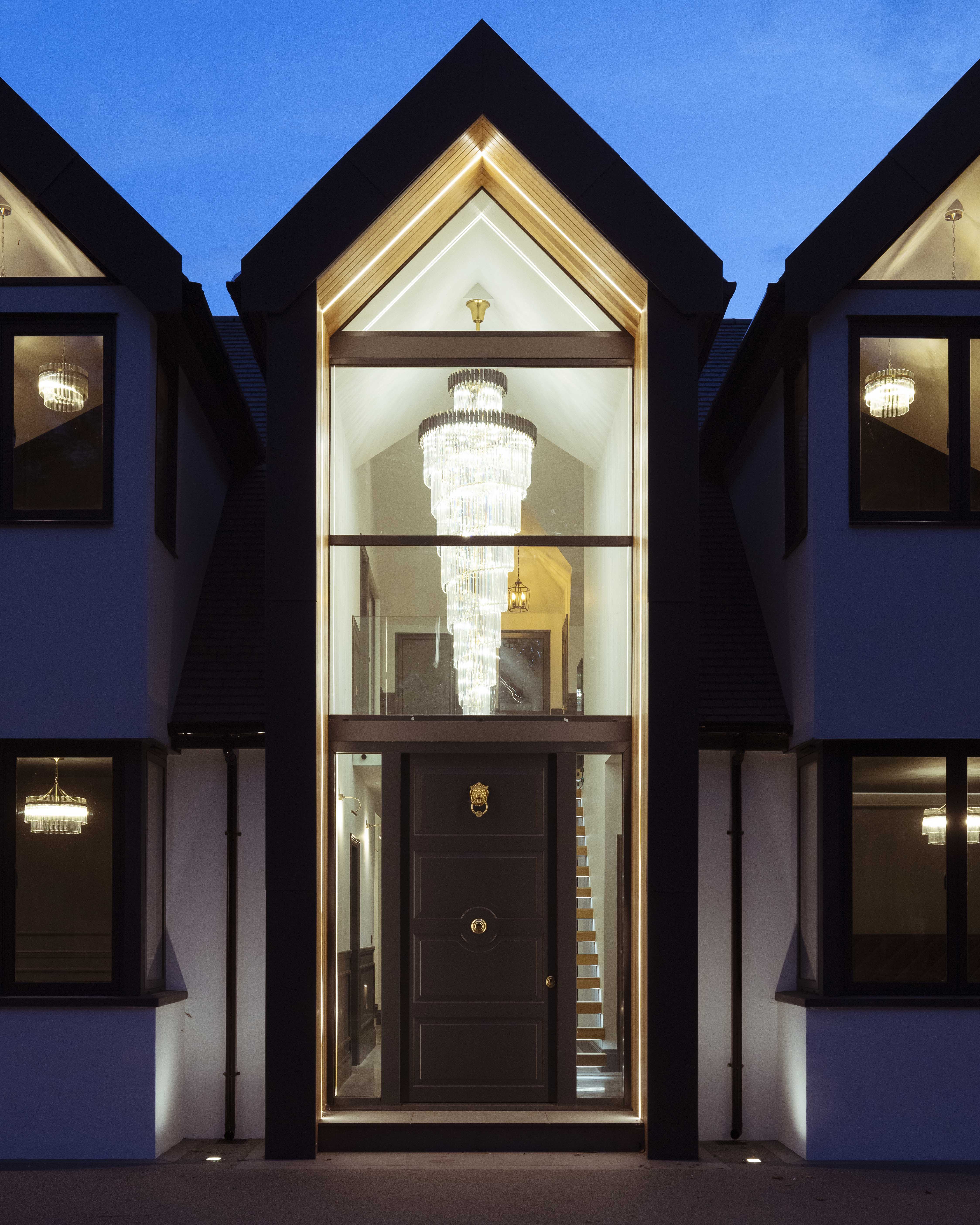luxury staircase chandelier double height entrance hall vorelli