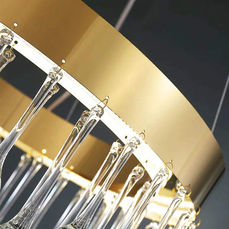 Detailed view of brushed ring frame and crystal droplet fittings on the Mancini chandelier