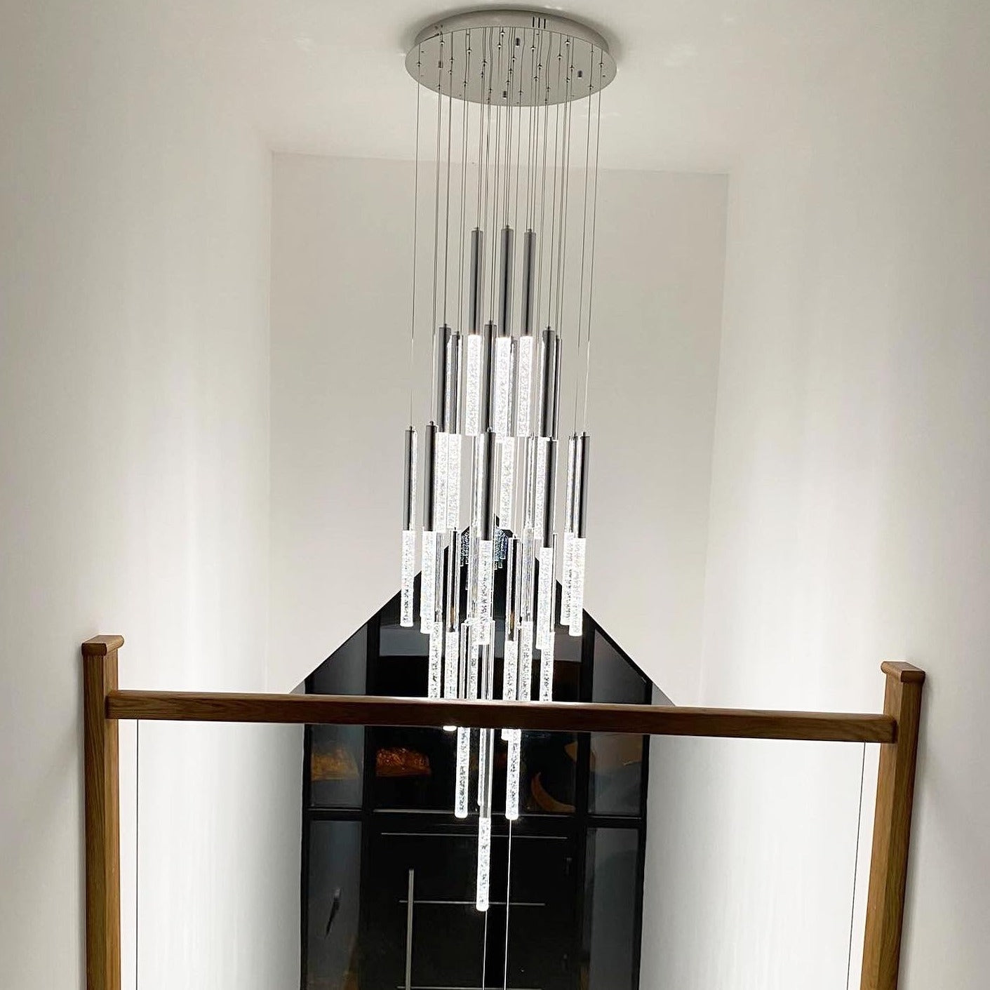Crystal staircase chandelier installed in Dubai luxury villa