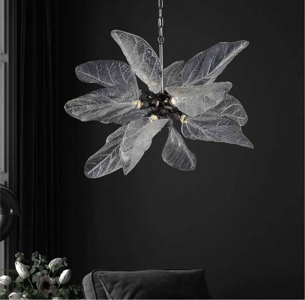 Ottobre pendant light over dining table with decorative glass leaf detailing