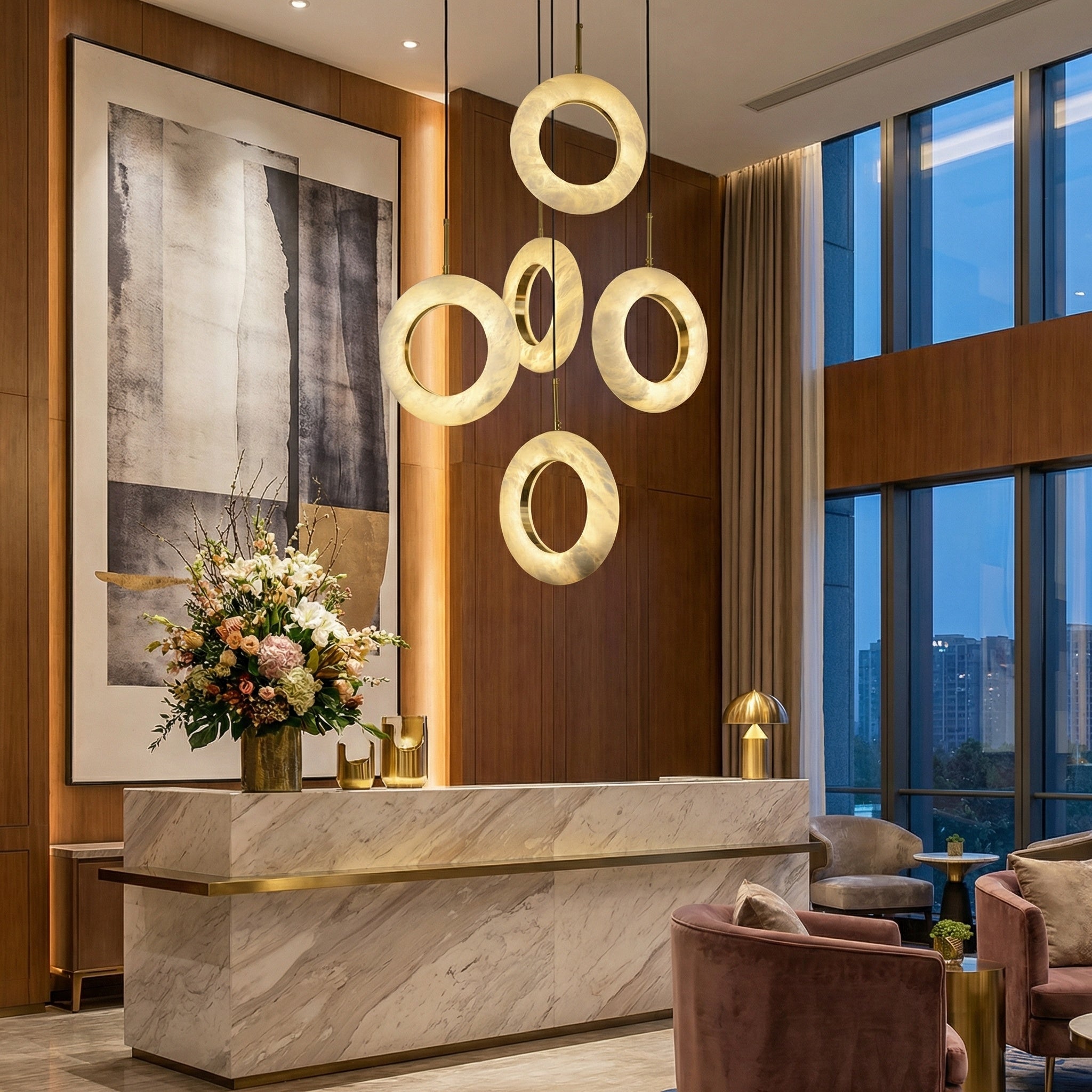 Pietra pendant staircase chandelier with luxury stone lighting in double-height interior