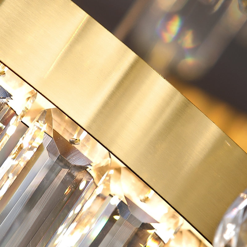 Close up of structured halo ring and polished frame detail on Prazzo staircase chandelier