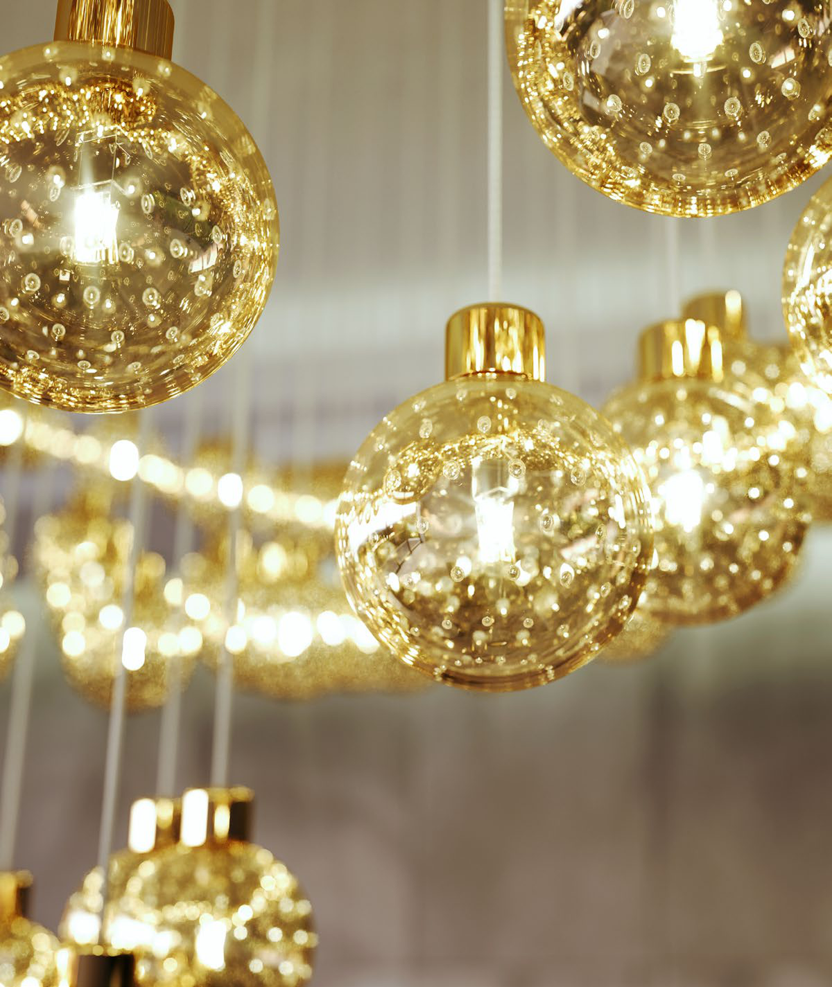 The luminous atmosphere created by the VORELLI Bubble Orb project installation, casting a soft and welcoming ambient warmth across a luxury space.