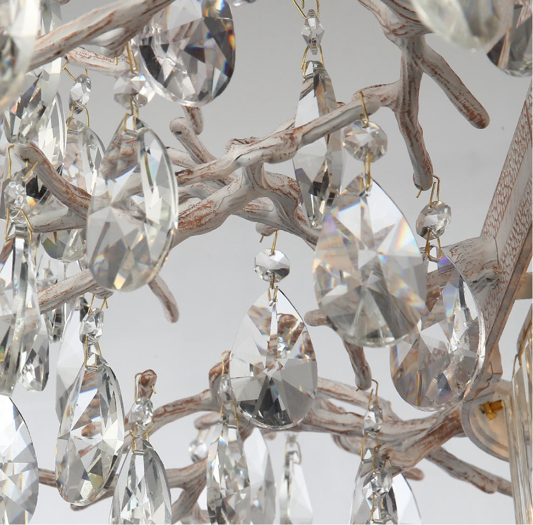 Close-up of Dewdrop circular chandelier II showcasing teardrop crystal details on an intricate branch-style frame