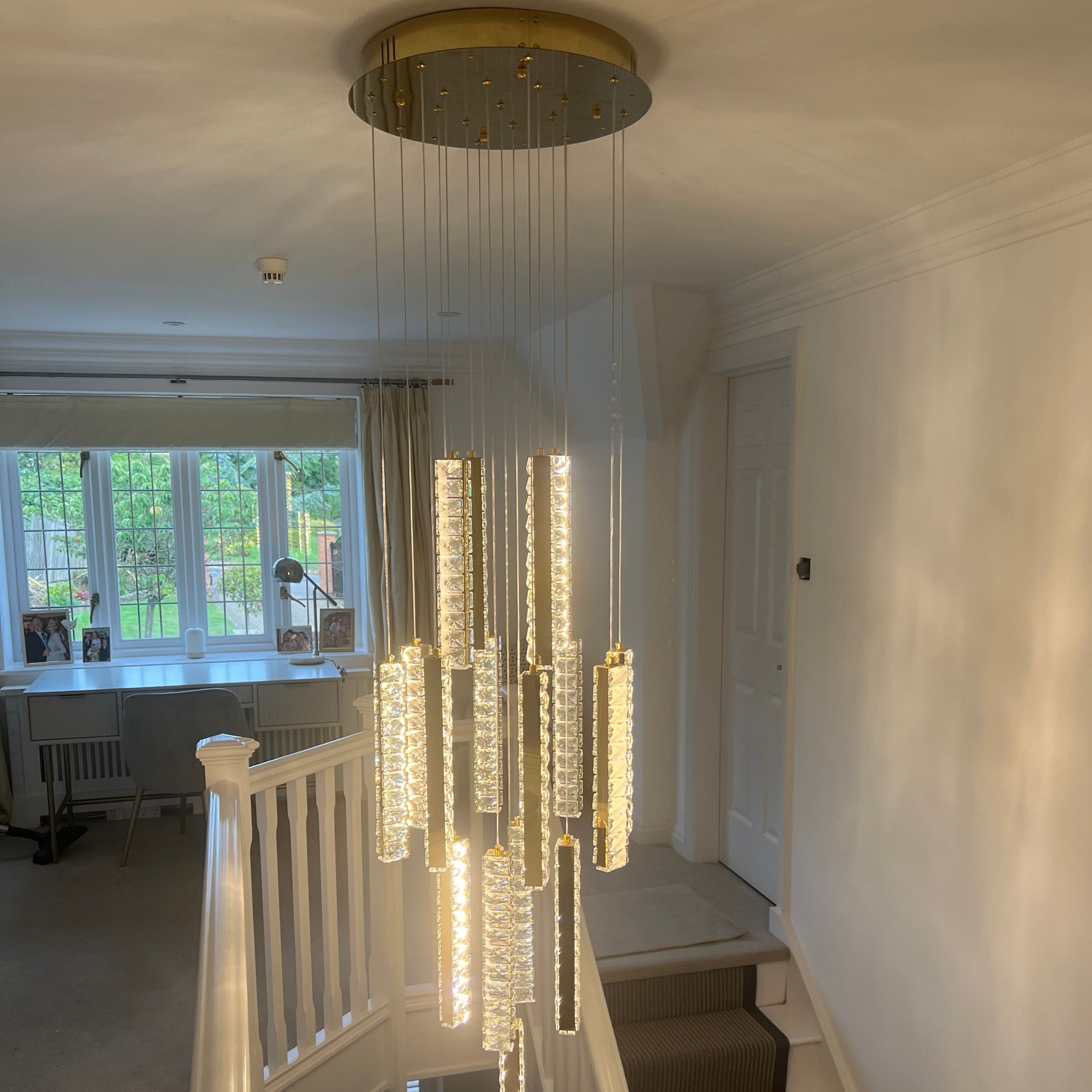 Fantasia pendant staircase chandelier cascading through multiple levels