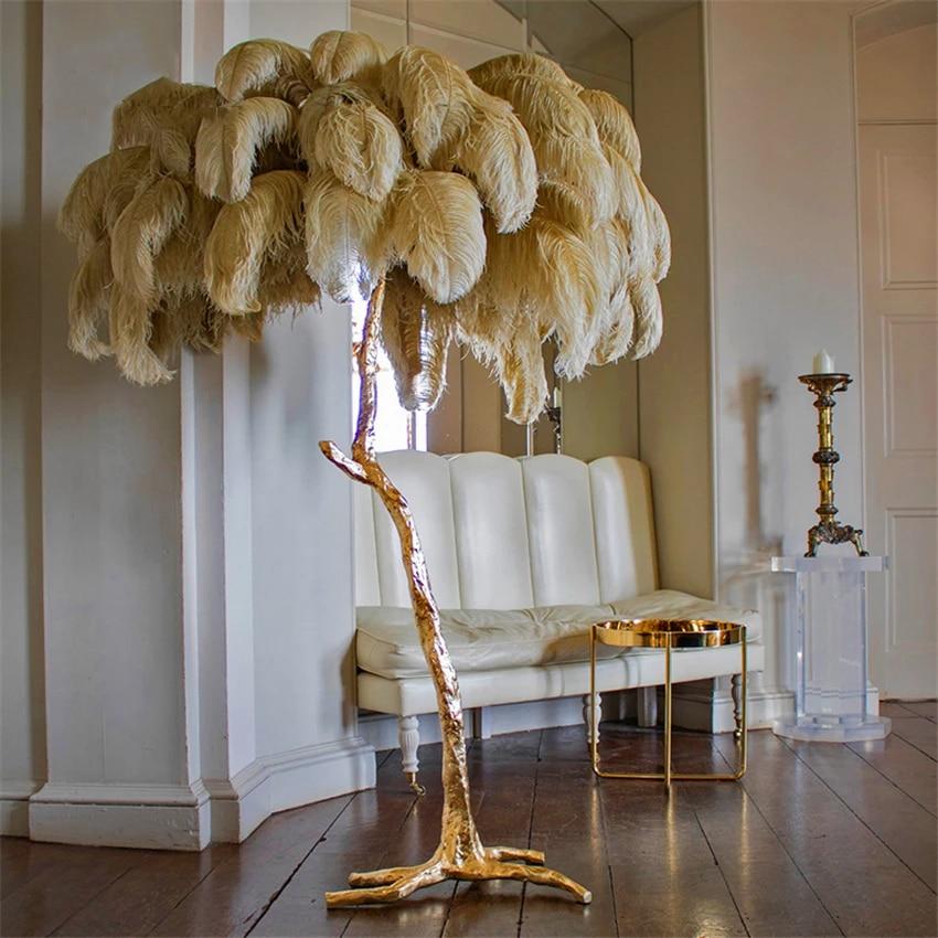 Feather floor lamp creating soft ambient lighting in luxury lounge