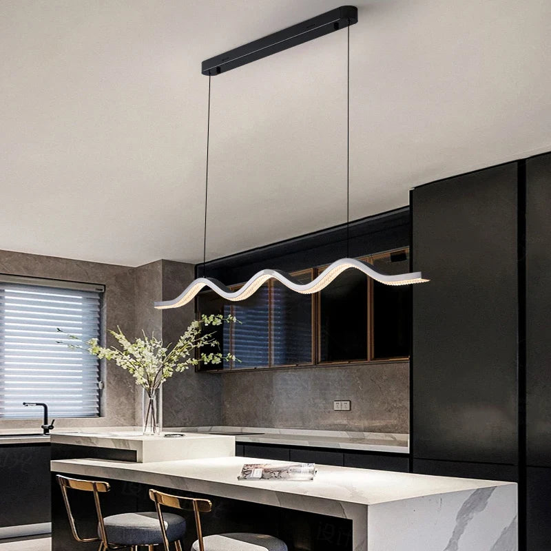 Formosa rectangular chandelier illuminating a luxury dining space