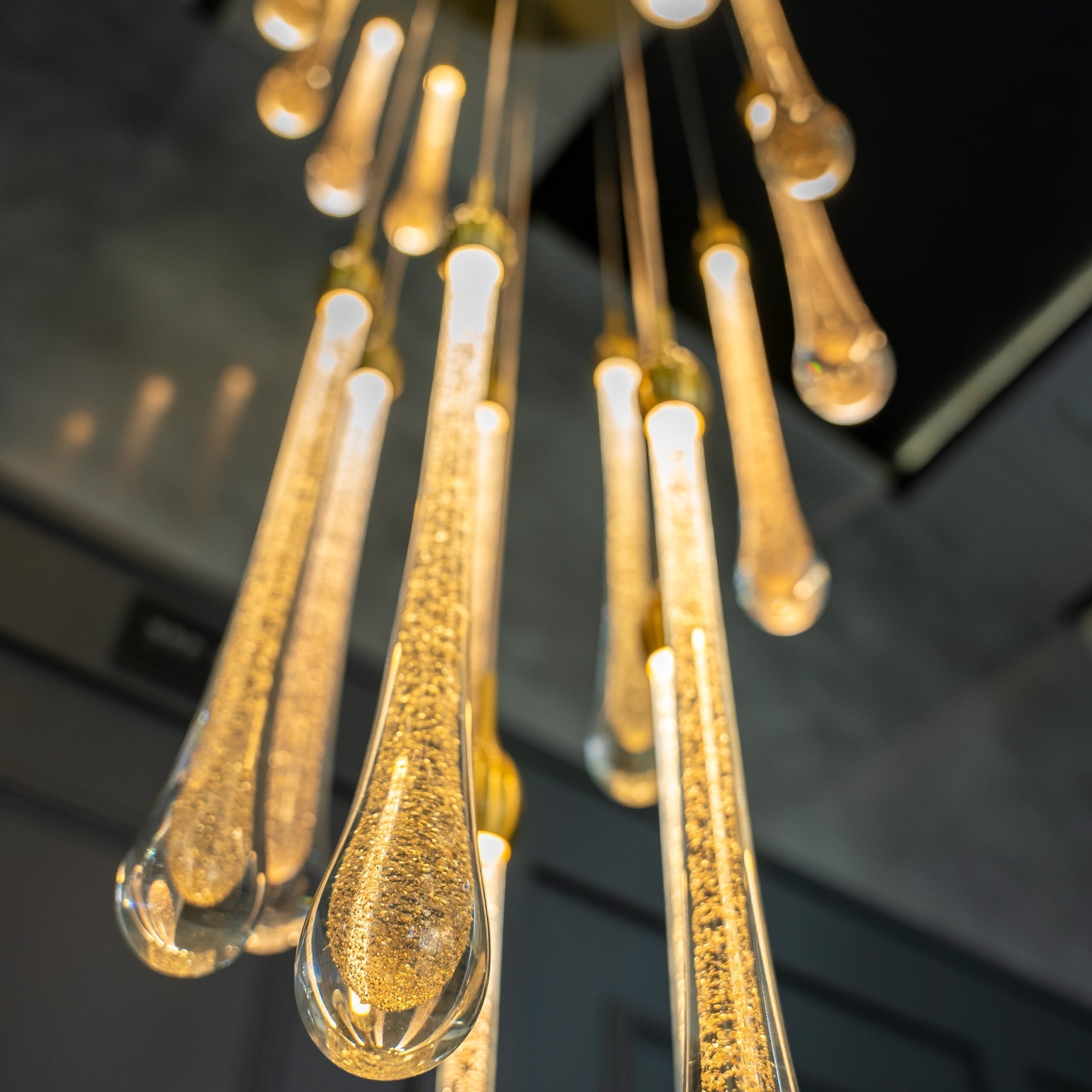 Crystal teardrop pendant detail with bubble texture on Foshan chandelier