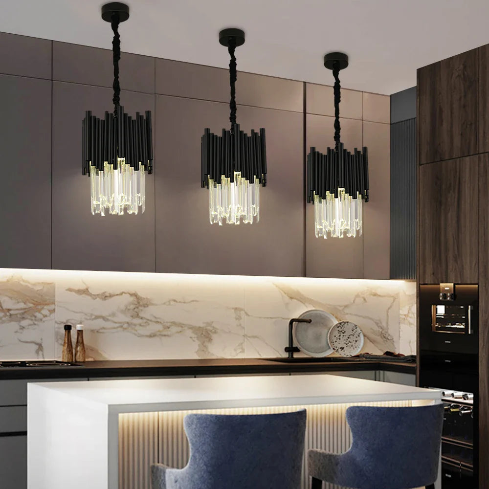 VORELLI® Gotham pendant light with black tubular frame and diamond cut crystal drops, designed for luxury kitchen islands, dining areas, and modern interiors.