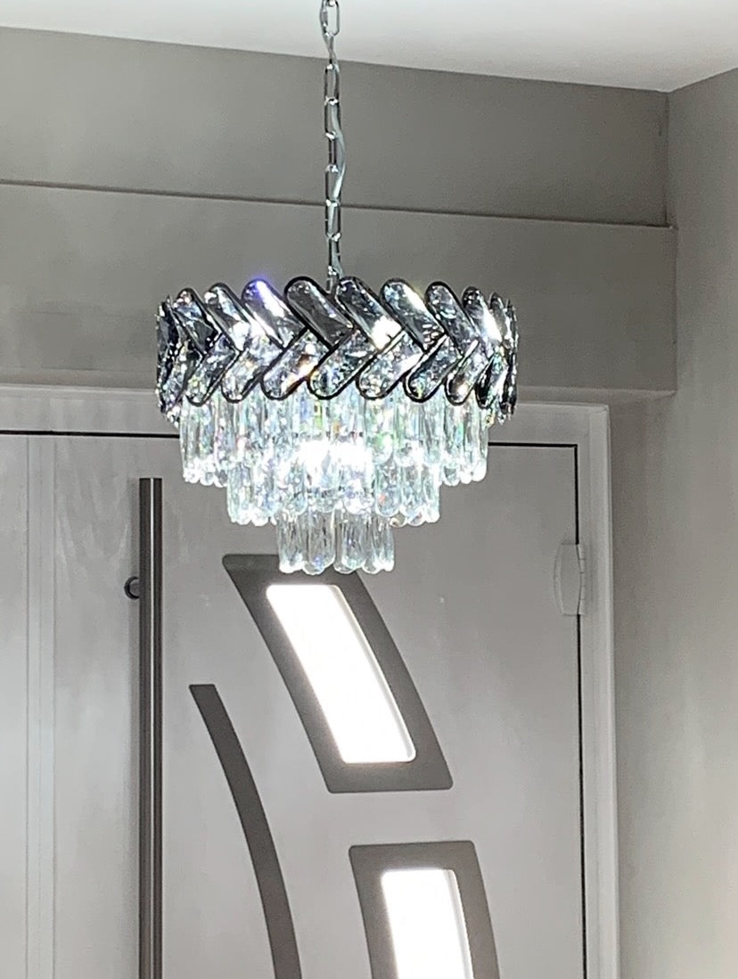 Knightsbridge circular crystal chandelier by VORELLI in modern luxury interior