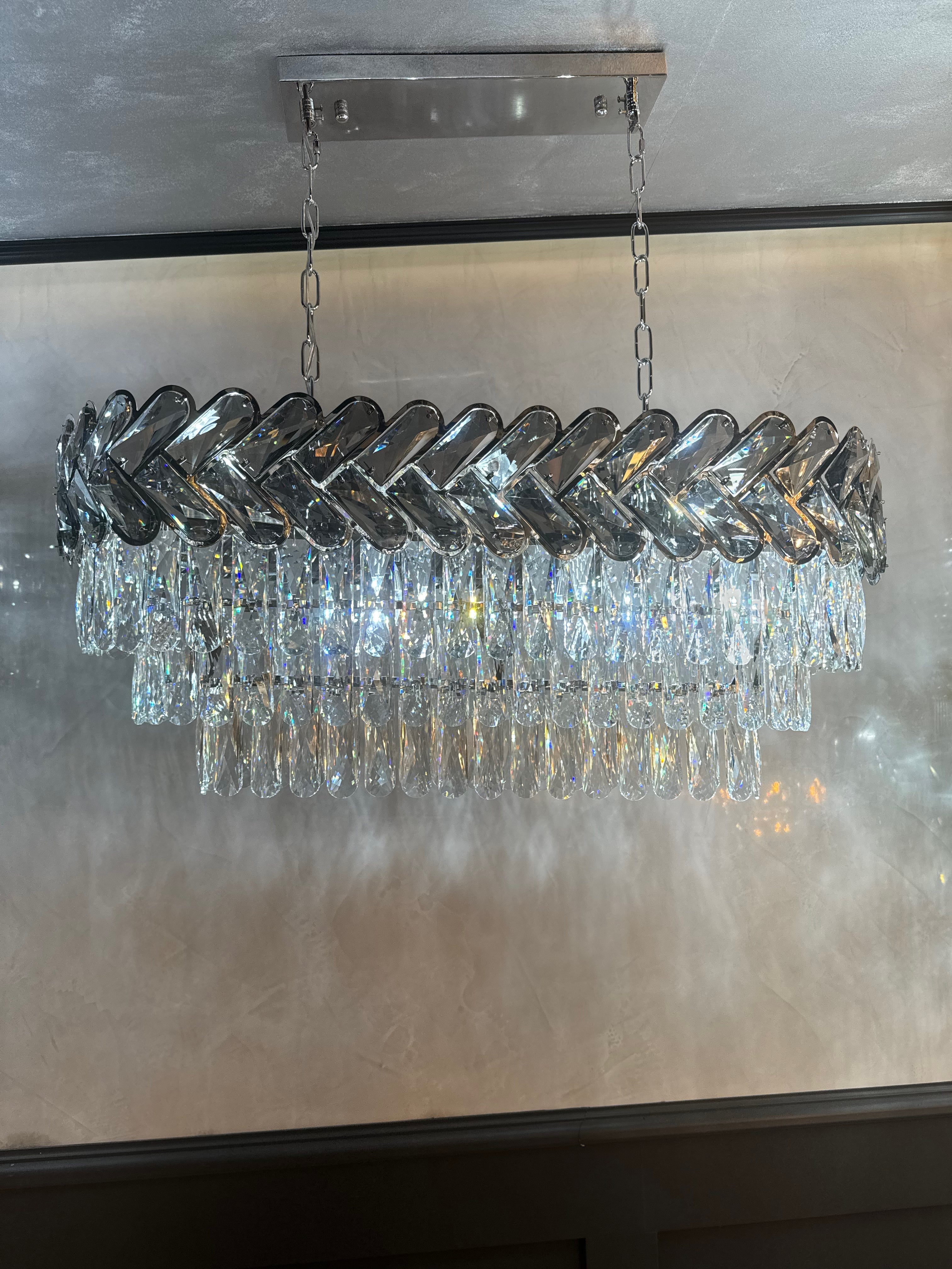 Knightsbridge rectangular crystal chandelier above dining table in elegant home interior