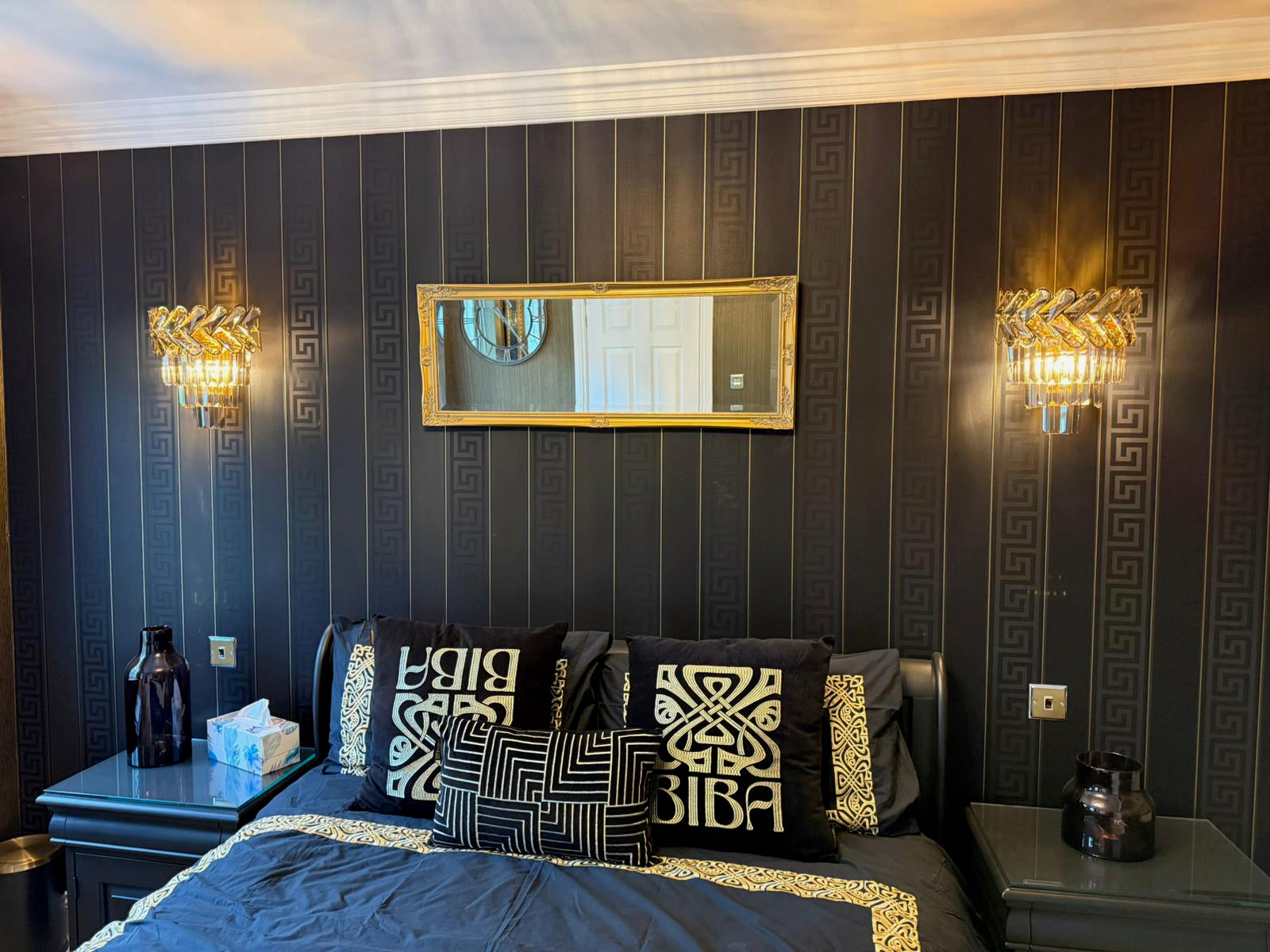 Knightsbridge crystal wall light used as elegant bedroom lighting feature